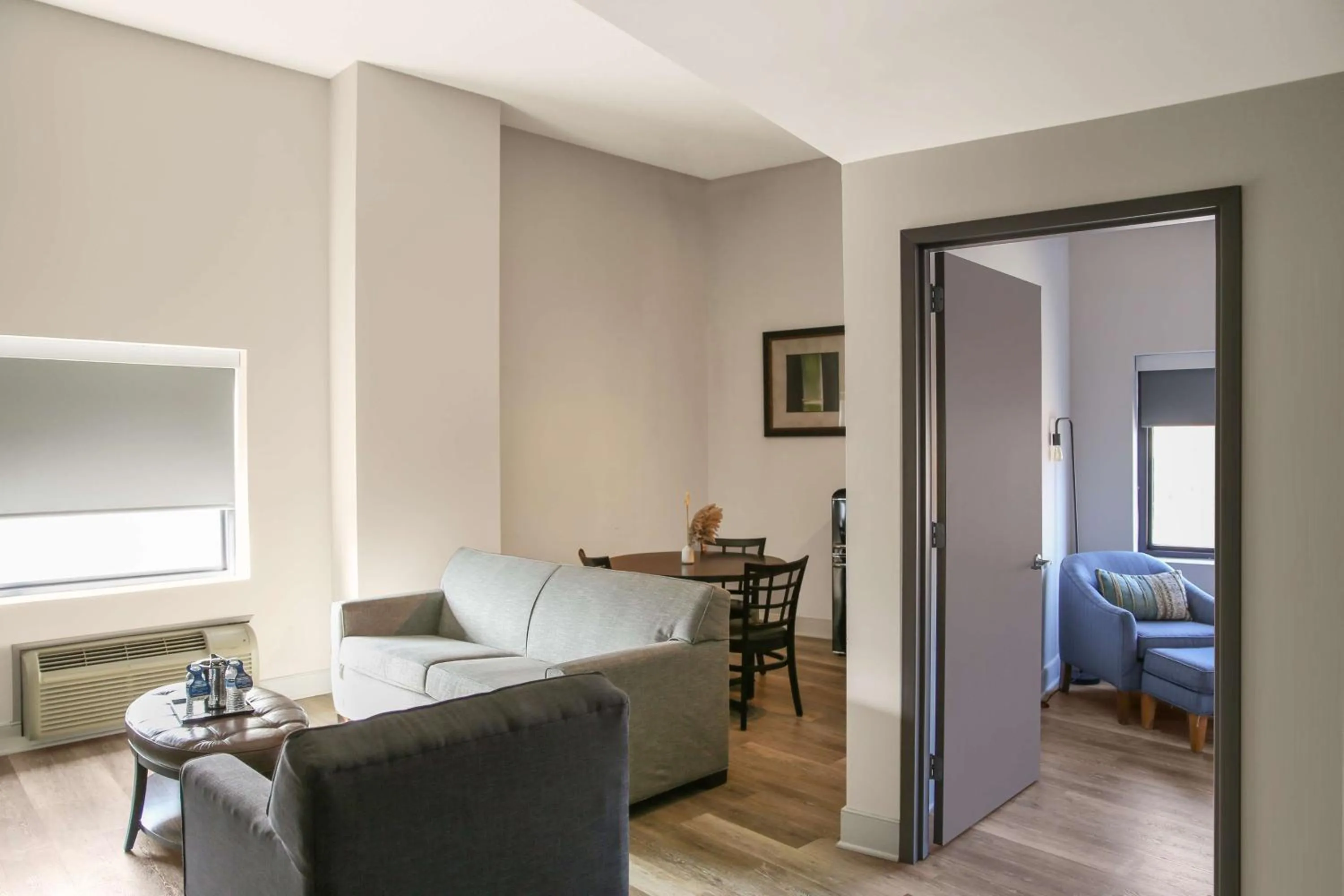 Living room, Bed in Watt Hotel Tapestry Collection by Hilton