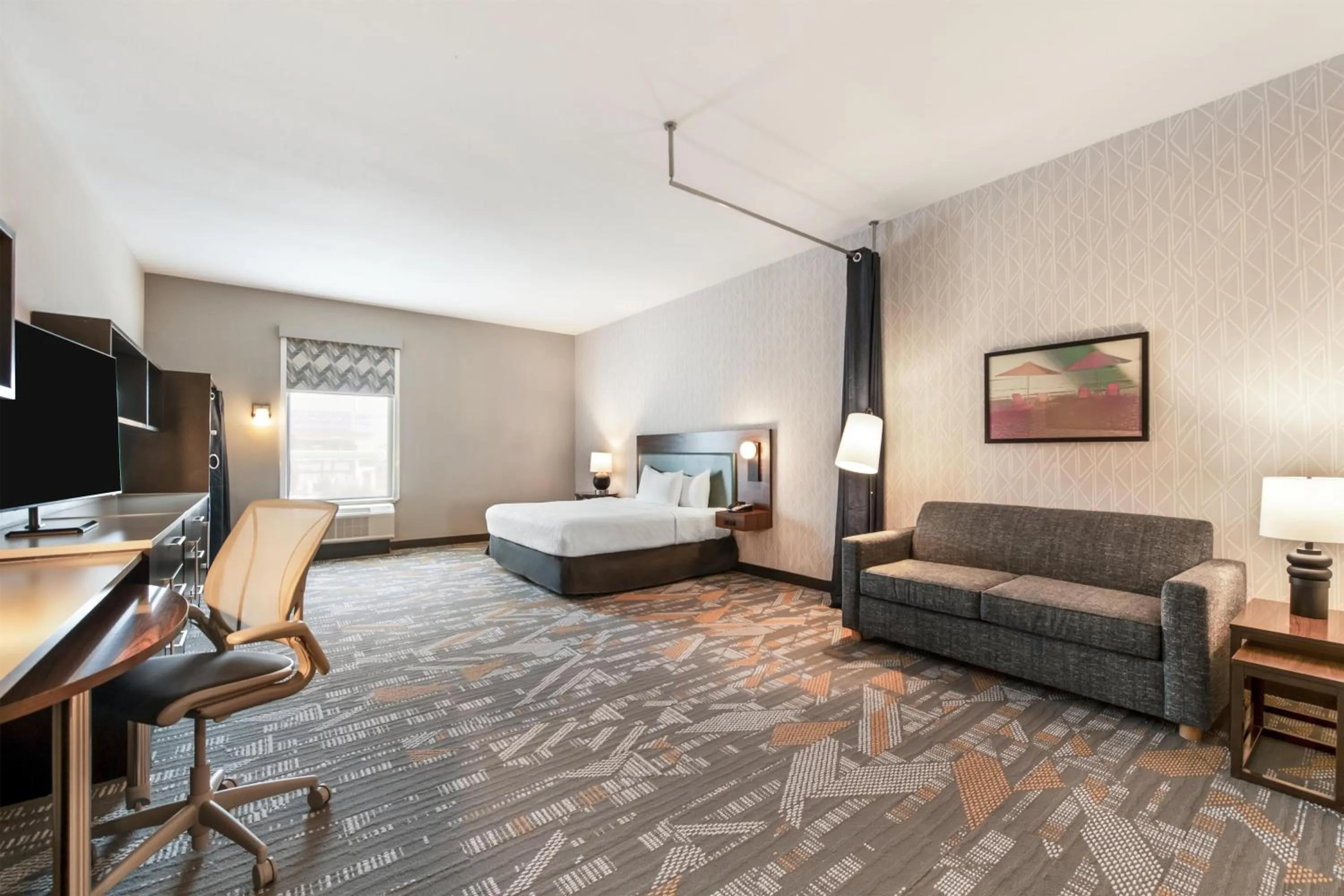 Living room, Bed in Home2 Suites Pensacola I-10 At North Davis Hwy