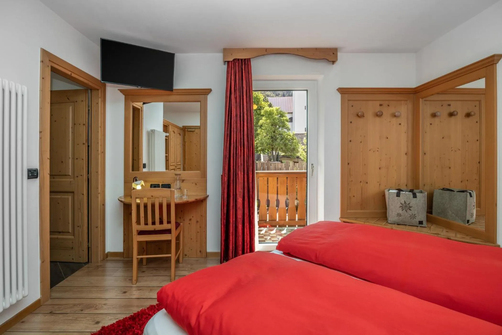 Bedroom, Bed in Hotel Tirol- Natural Idyll