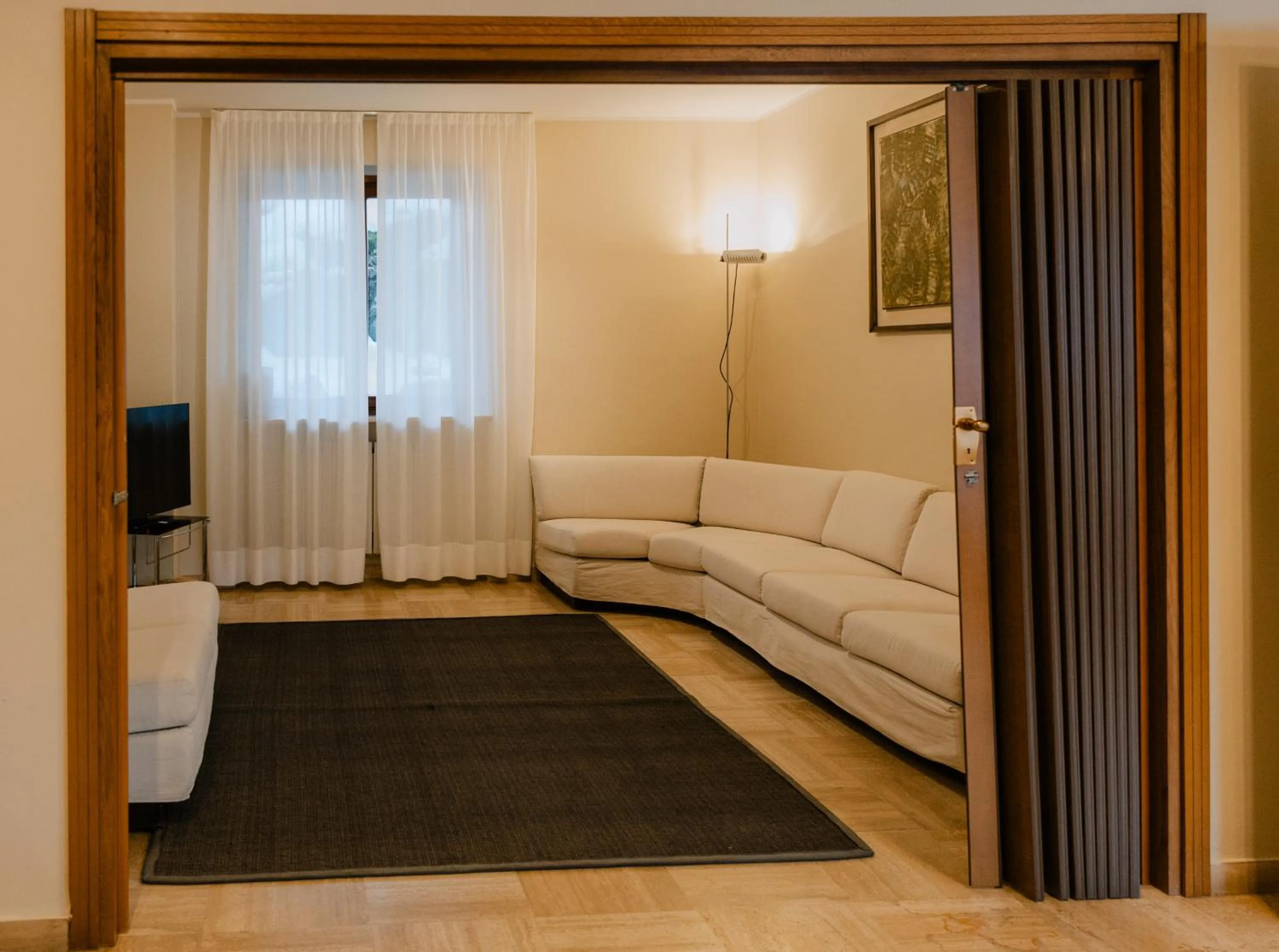 Communal lounge/ TV room in Hotel Costaverde "ai Roni"