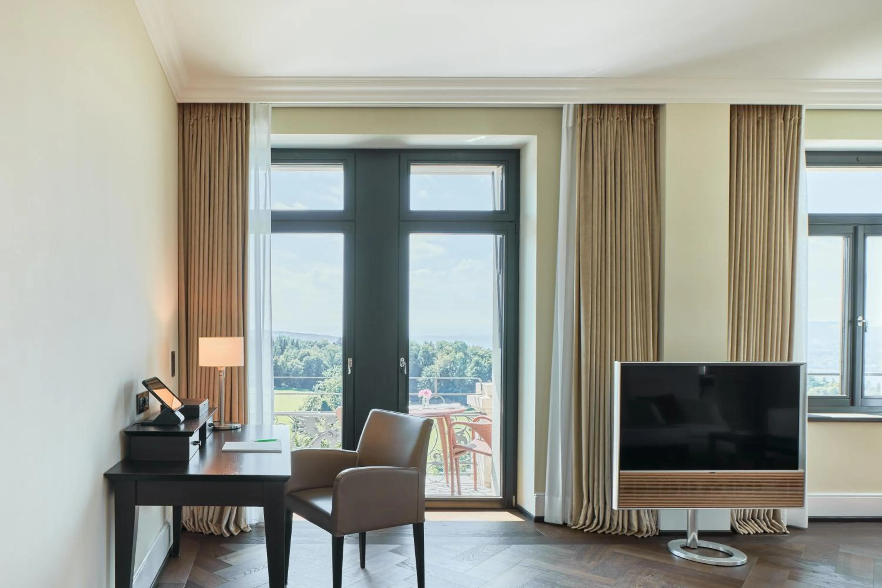 Communal lounge/ TV room in The Dolder Grand - City and Spa Resort Zurich