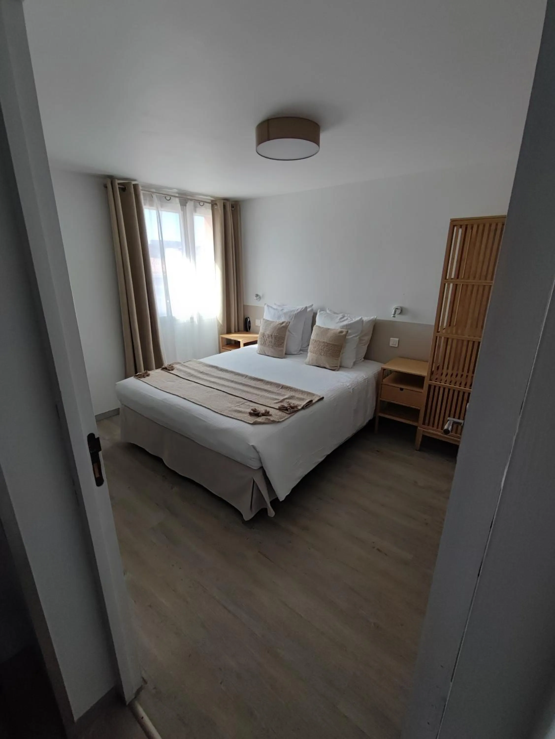 Photo of the whole room, Bed in Logis Hotel De La Clape