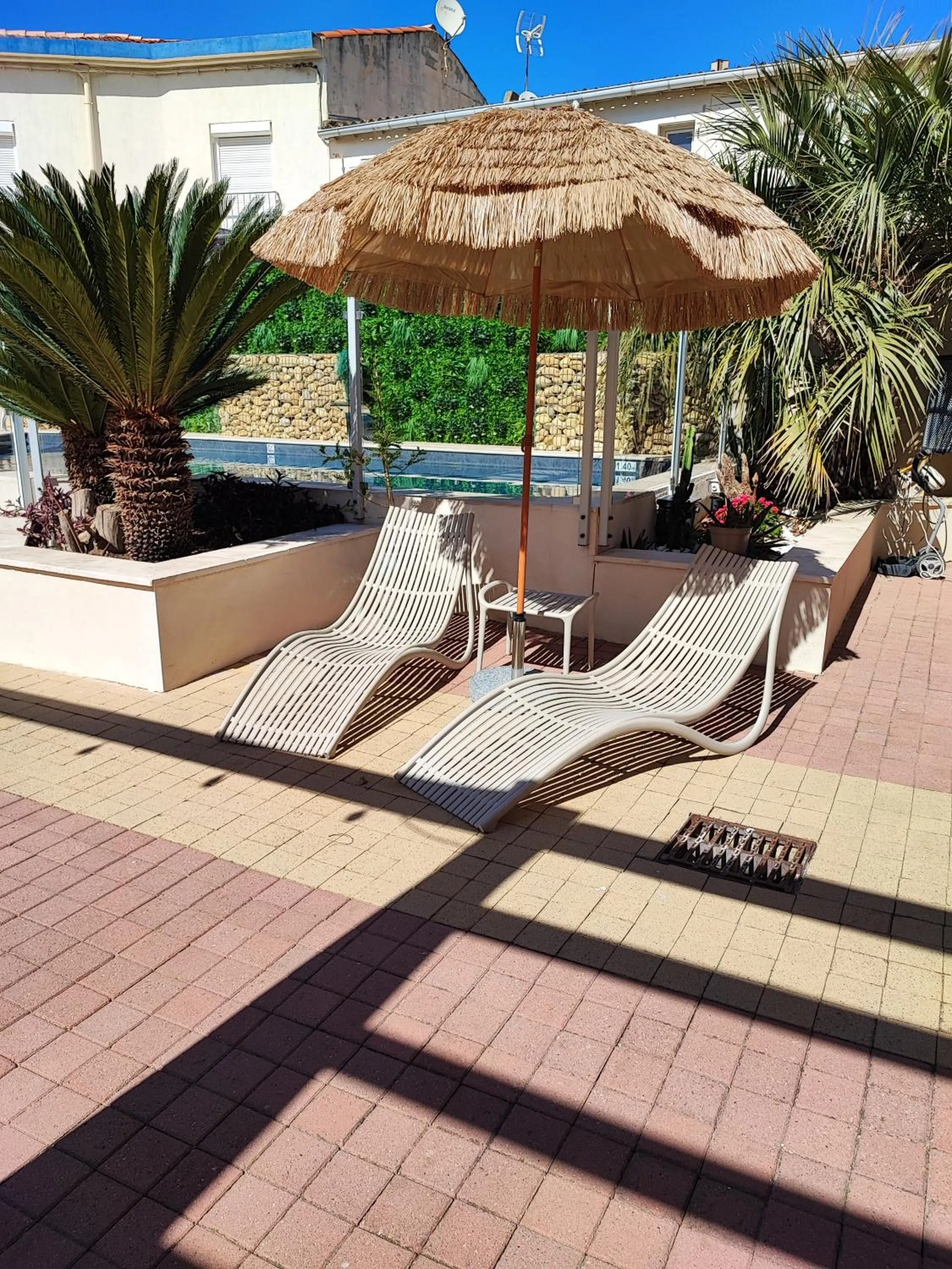 Swimming pool in Logis Hotel De La Clape