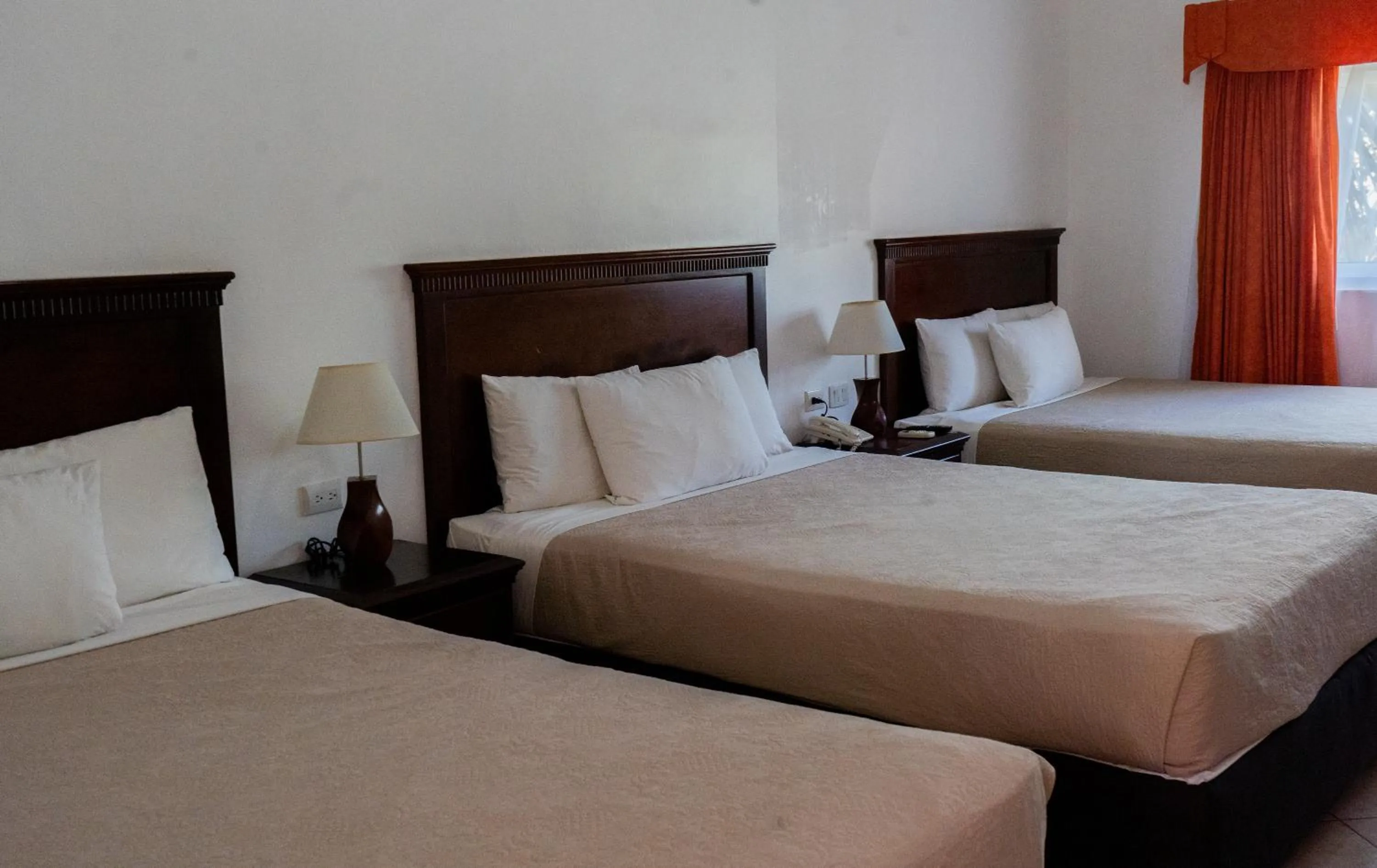 Bed in Hotel Cayman Suites