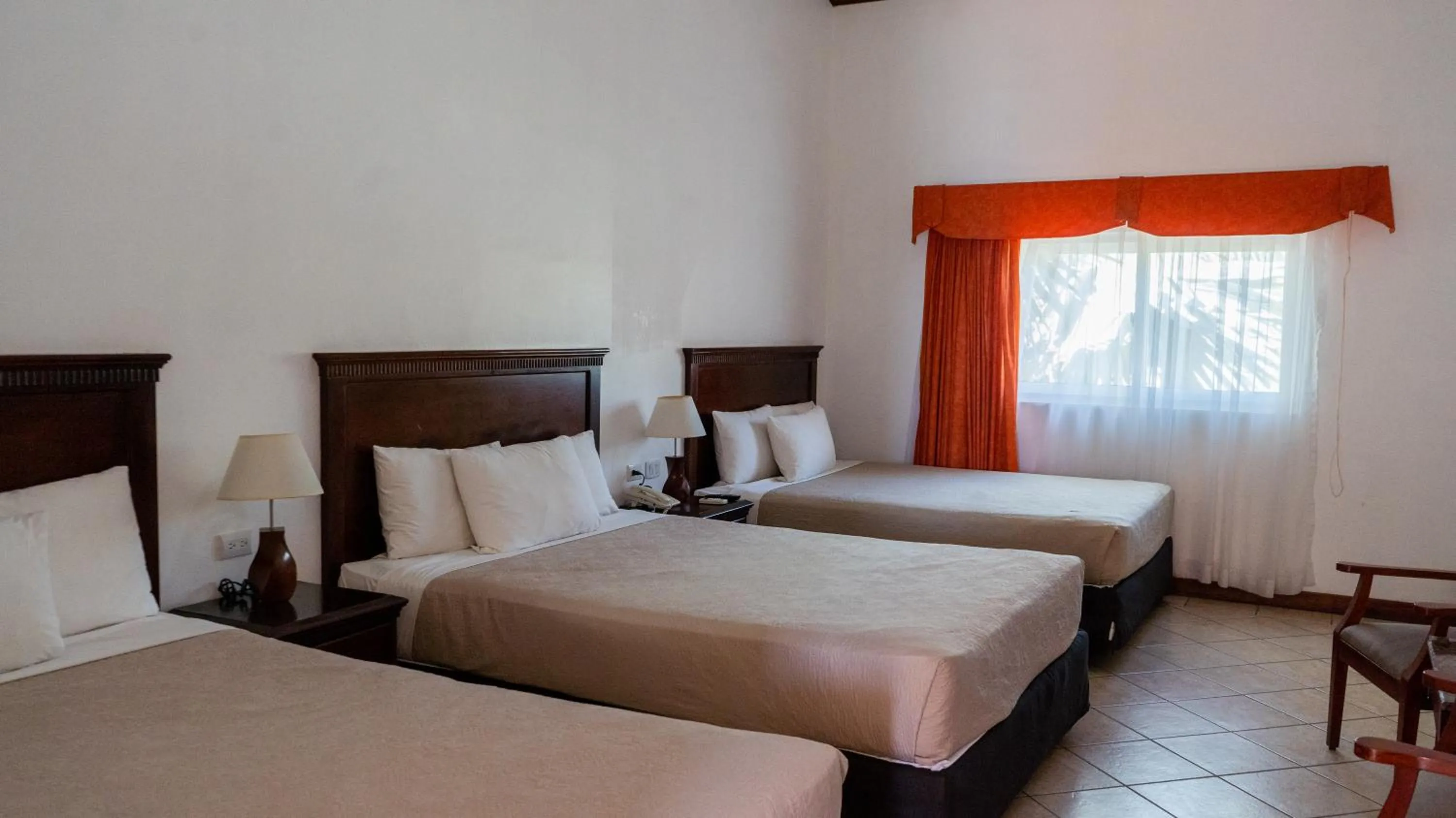 Bed in Hotel Cayman Suites