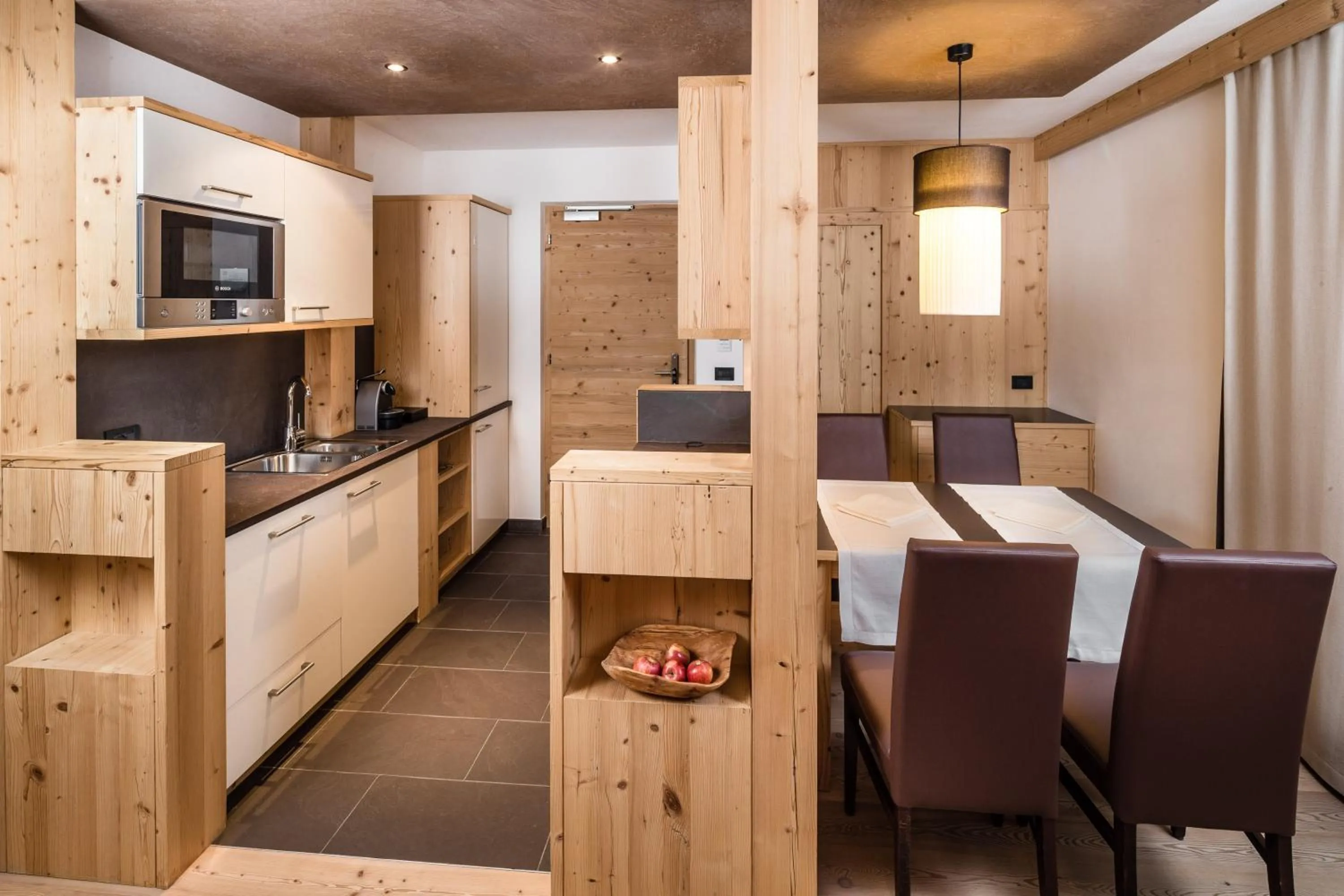 Kitchen or kitchenette in Lagació Hotel Mountain Residence