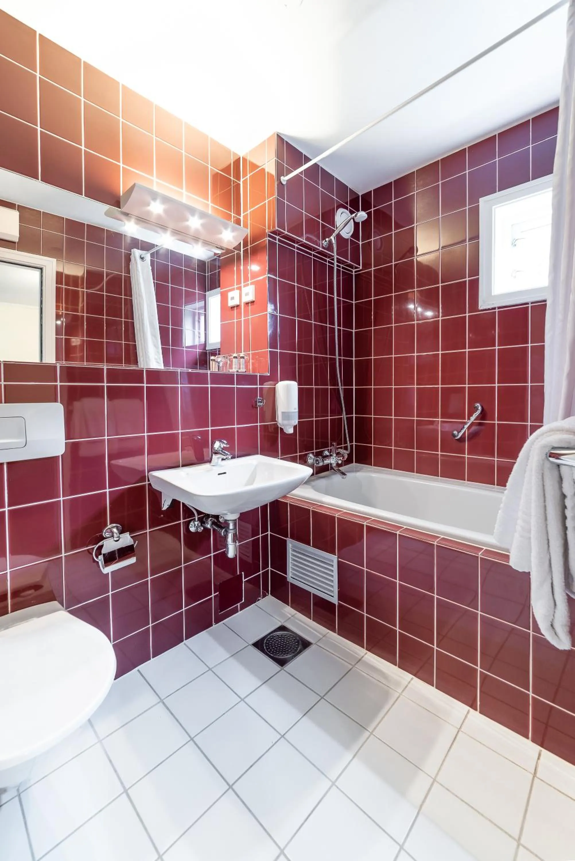 Bathroom in Kronen Gaard Hotel