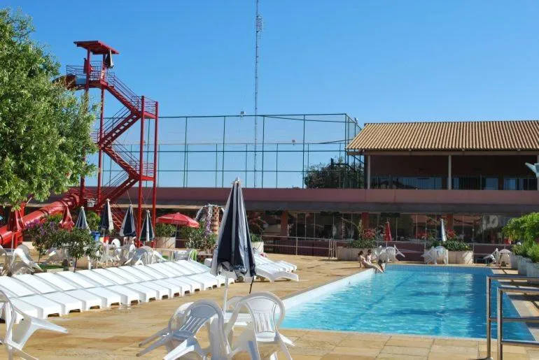 Communal lounge/ TV room in diRoma Fiori Caldas Novas - ACHEI FERIAS - Com Roupa de Cama