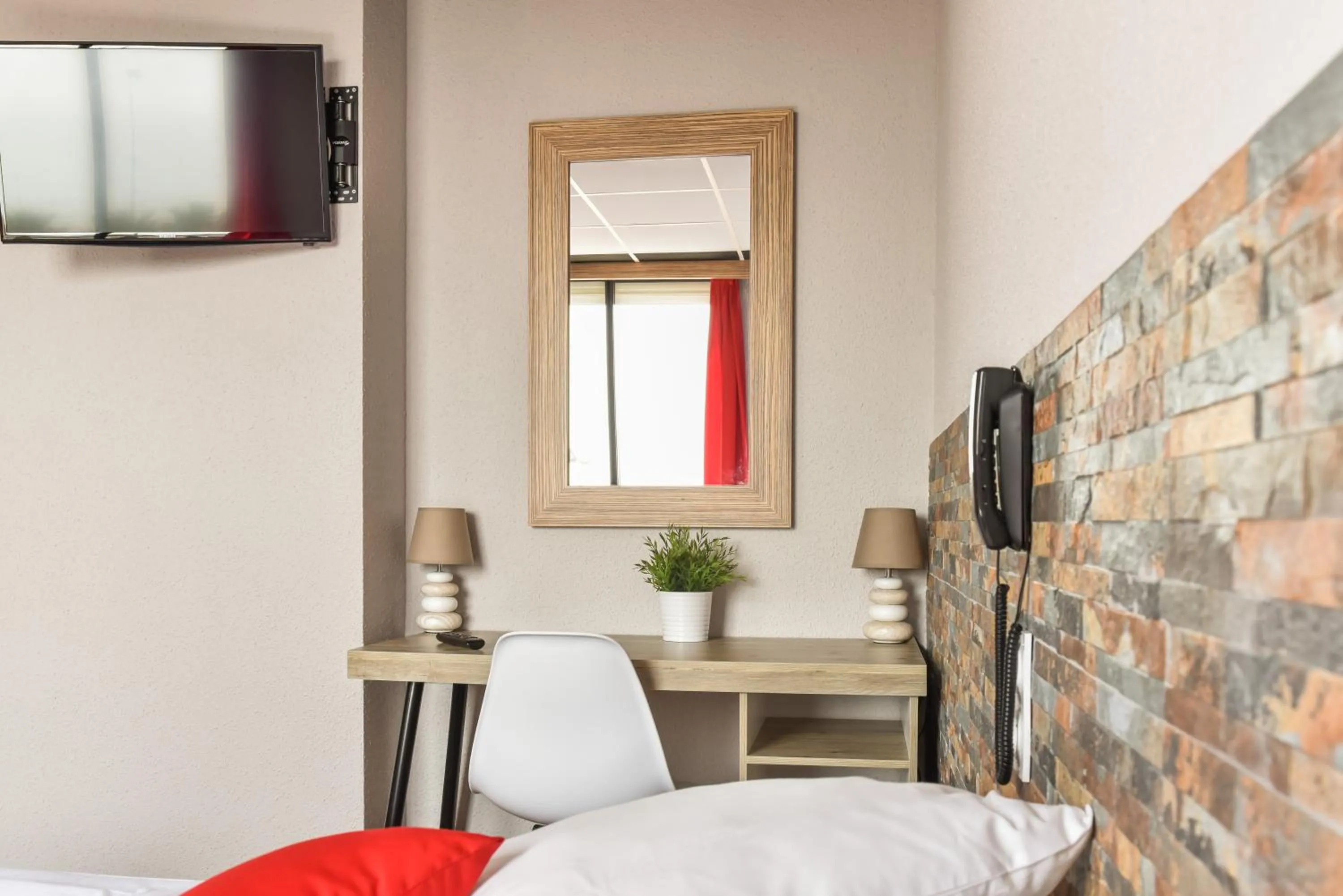 Decorative detail, Bed in Logis Hôtel Restaurant Mar I Sol