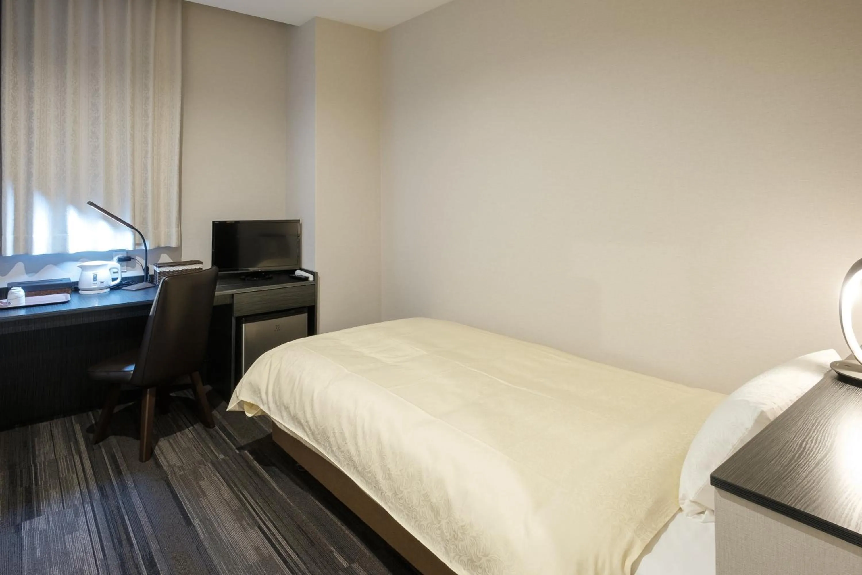 Bed in The Premium Hotel In Rinku