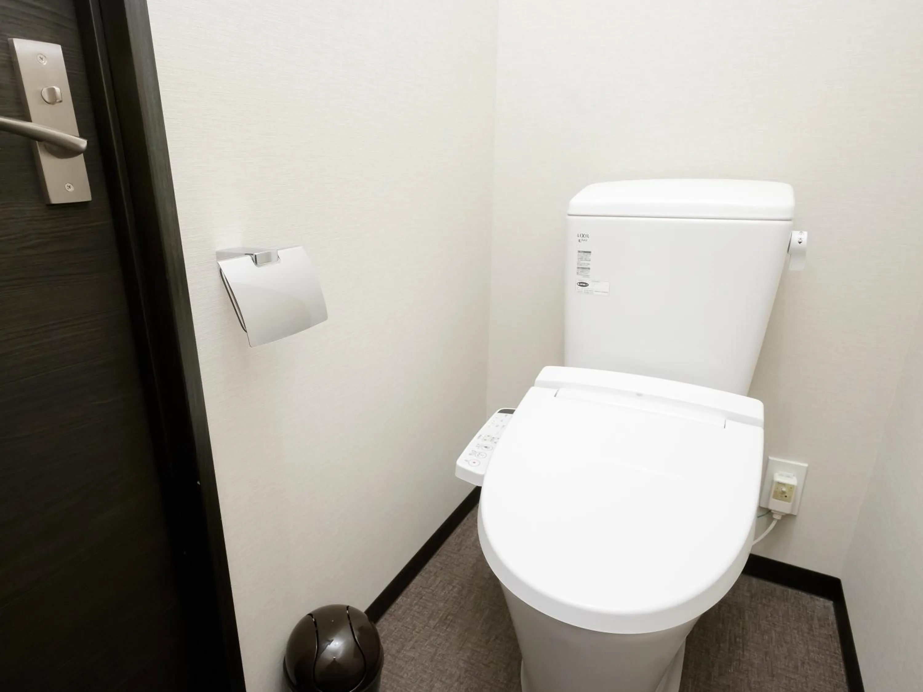 Toilet in The Premium Hotel In Rinku