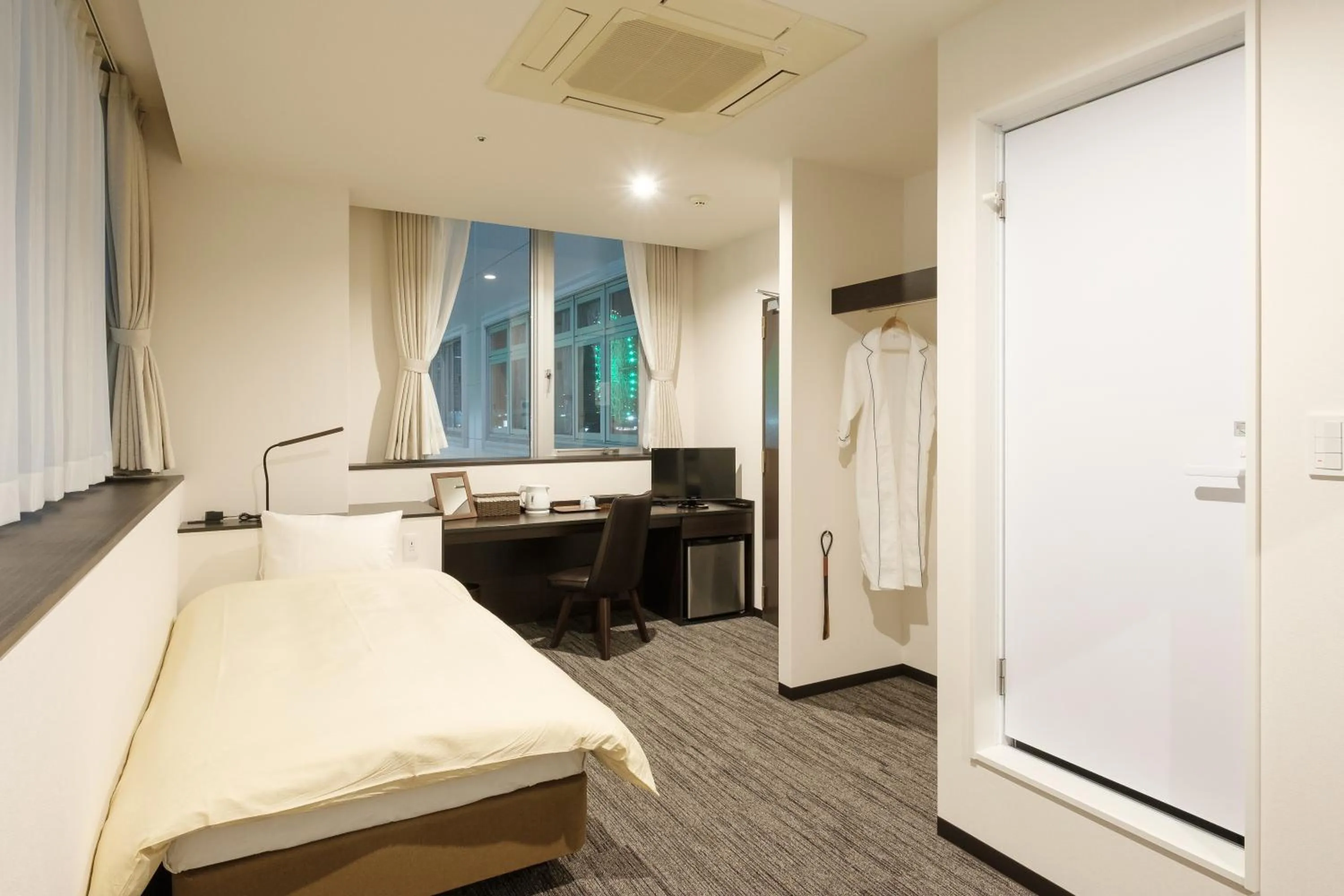 Photo of the whole room, Bed in The Premium Hotel In Rinku