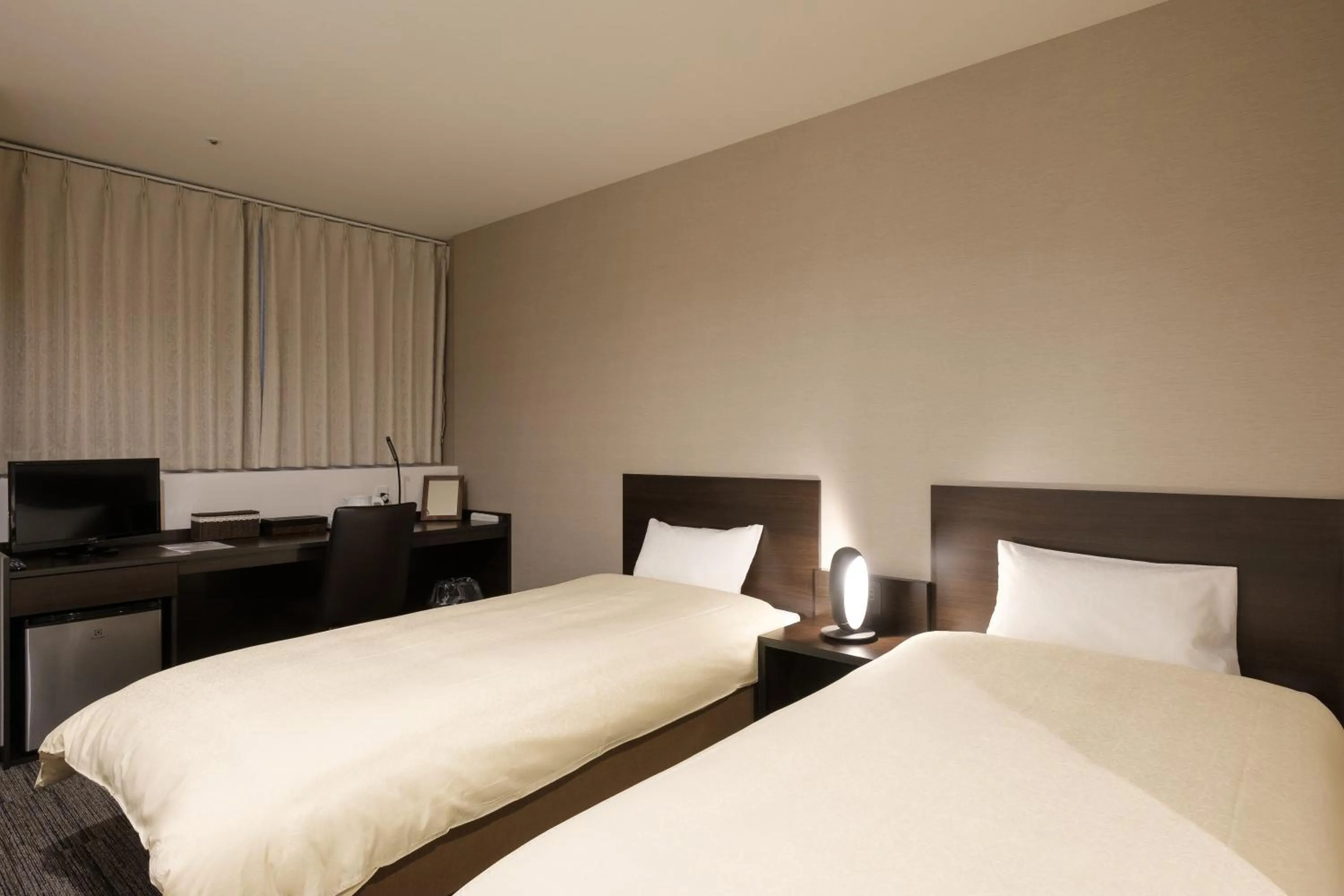 Bed in The Premium Hotel In Rinku