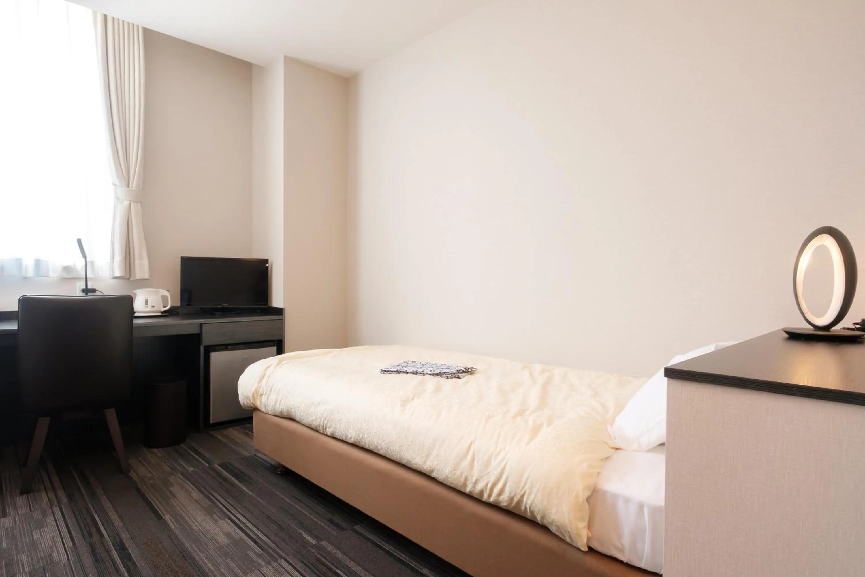 Bed in The Premium Hotel In Rinku