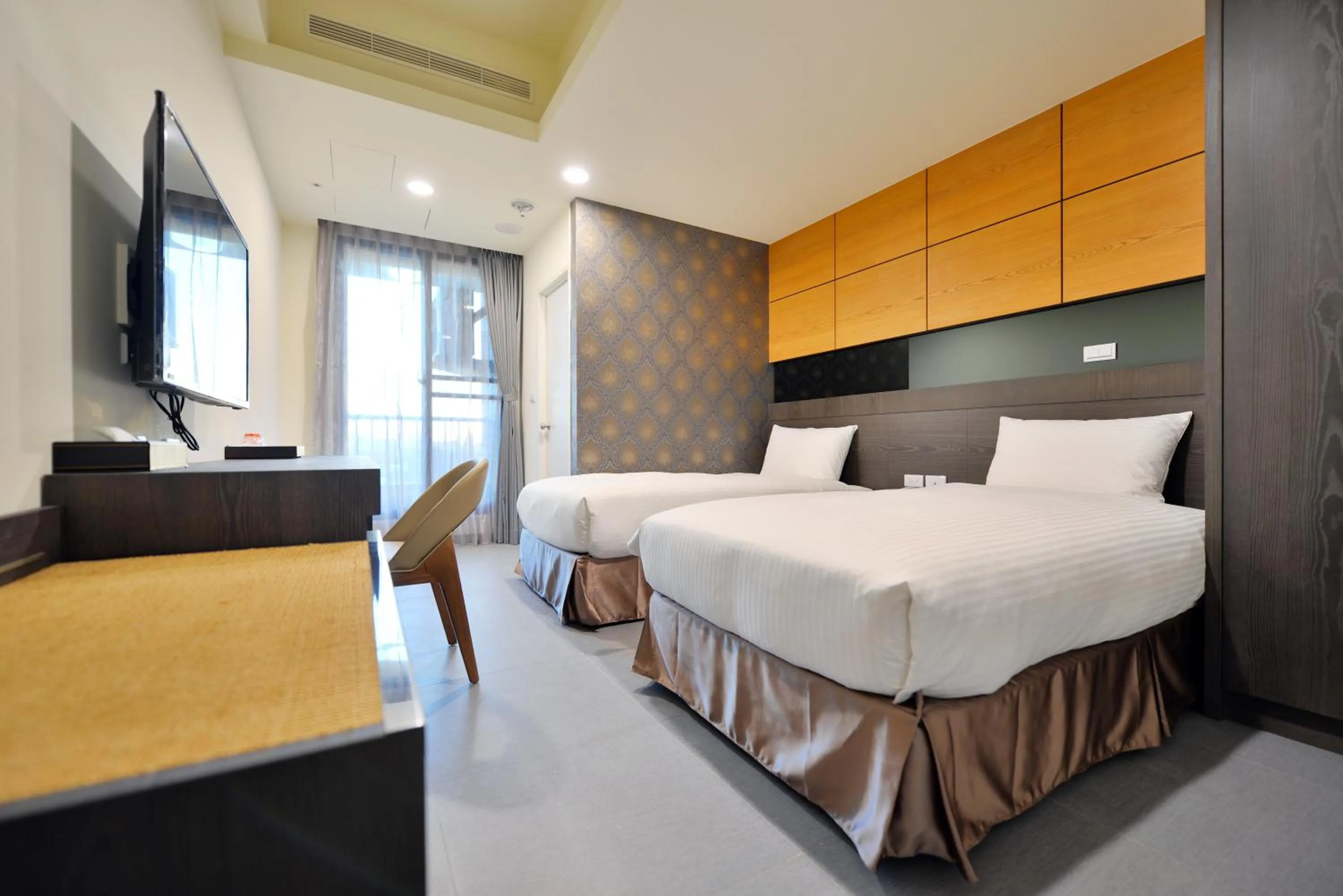 Bed in San Juan Easy Stay Inn Tainan