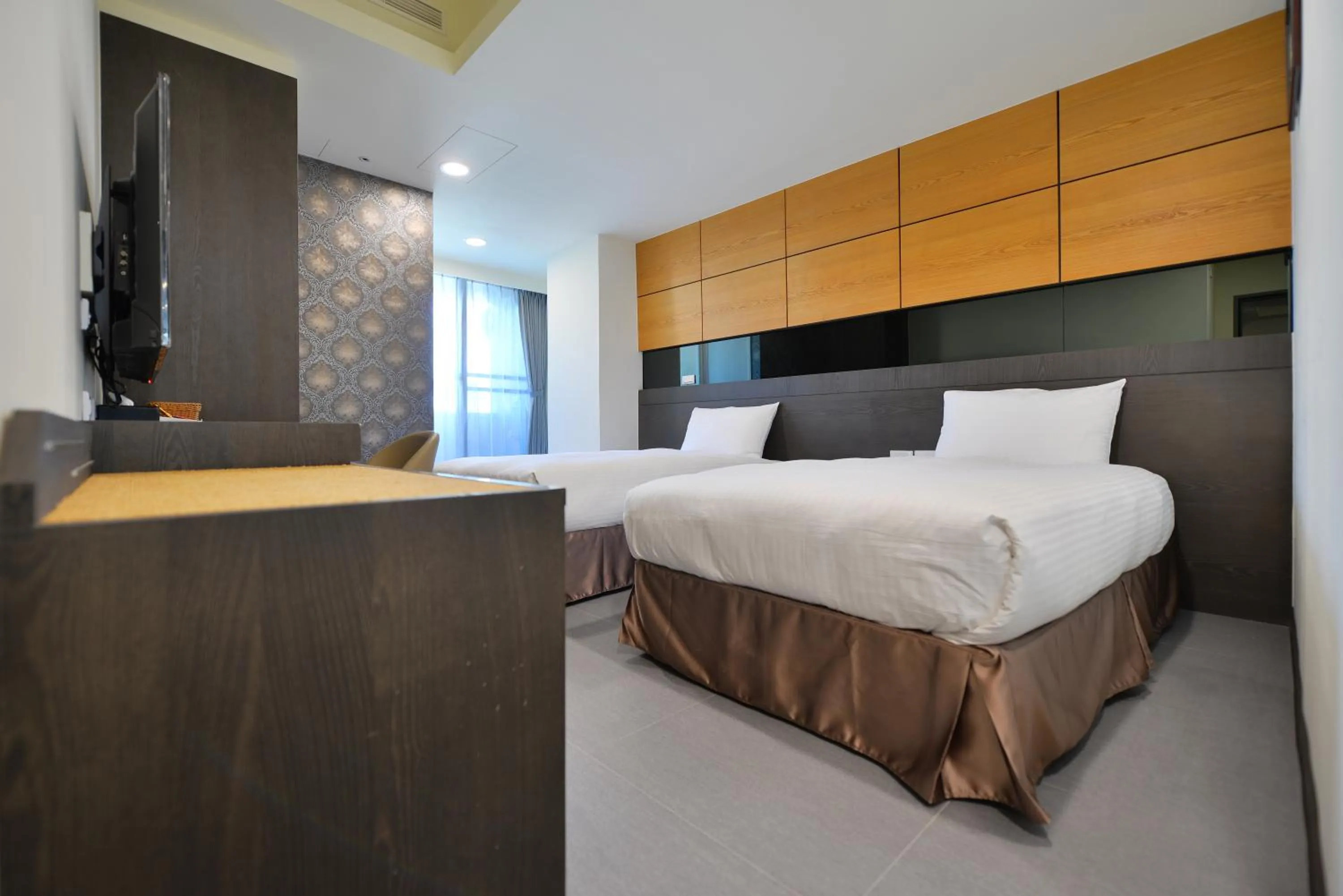 Bed in San Juan Easy Stay Inn Tainan