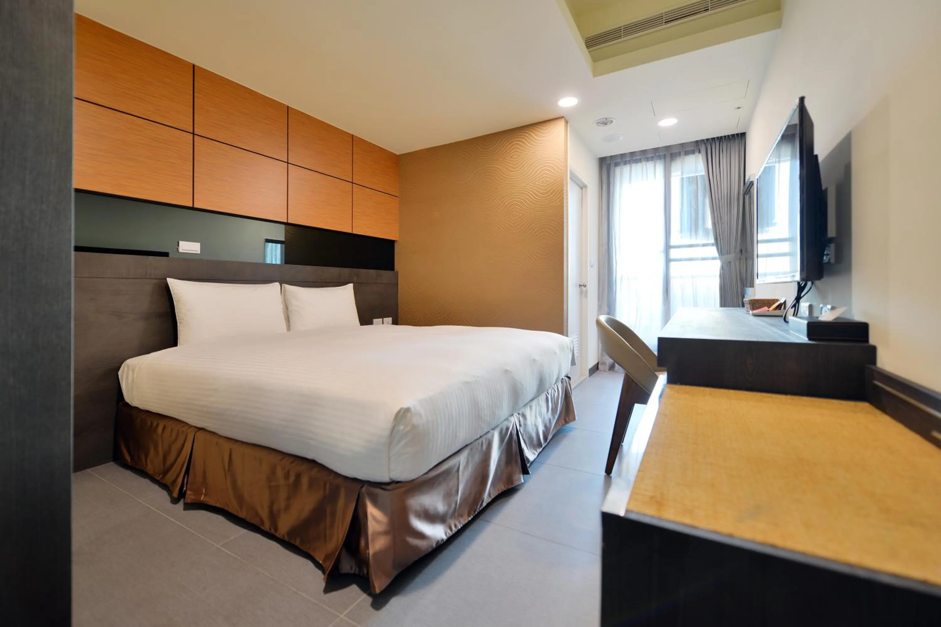 Bed in San Juan Easy Stay Inn Tainan