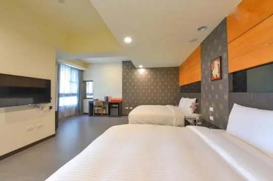 Bed in San Juan Easy Stay Inn Tainan