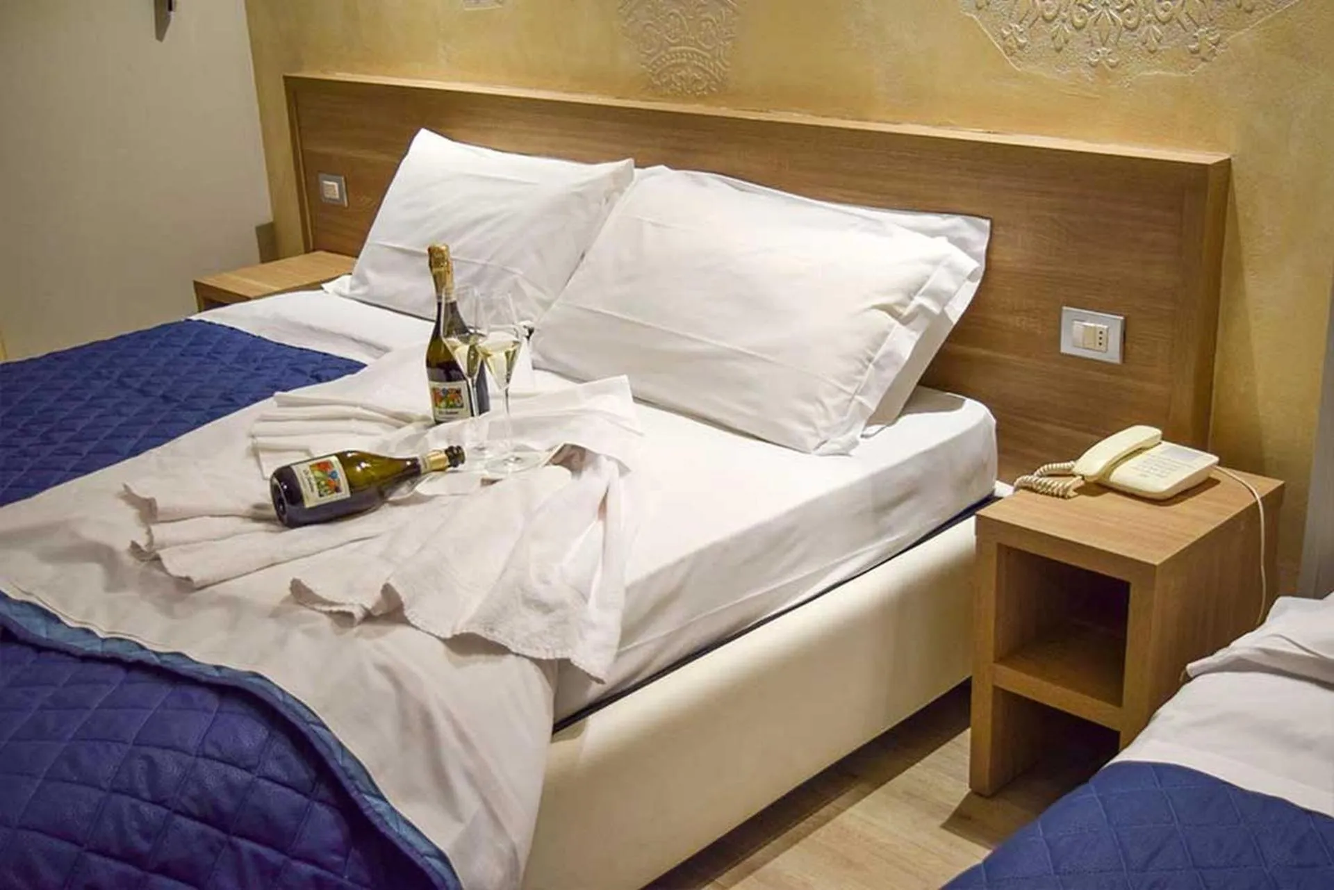 Bed in Le Grazie Hotel