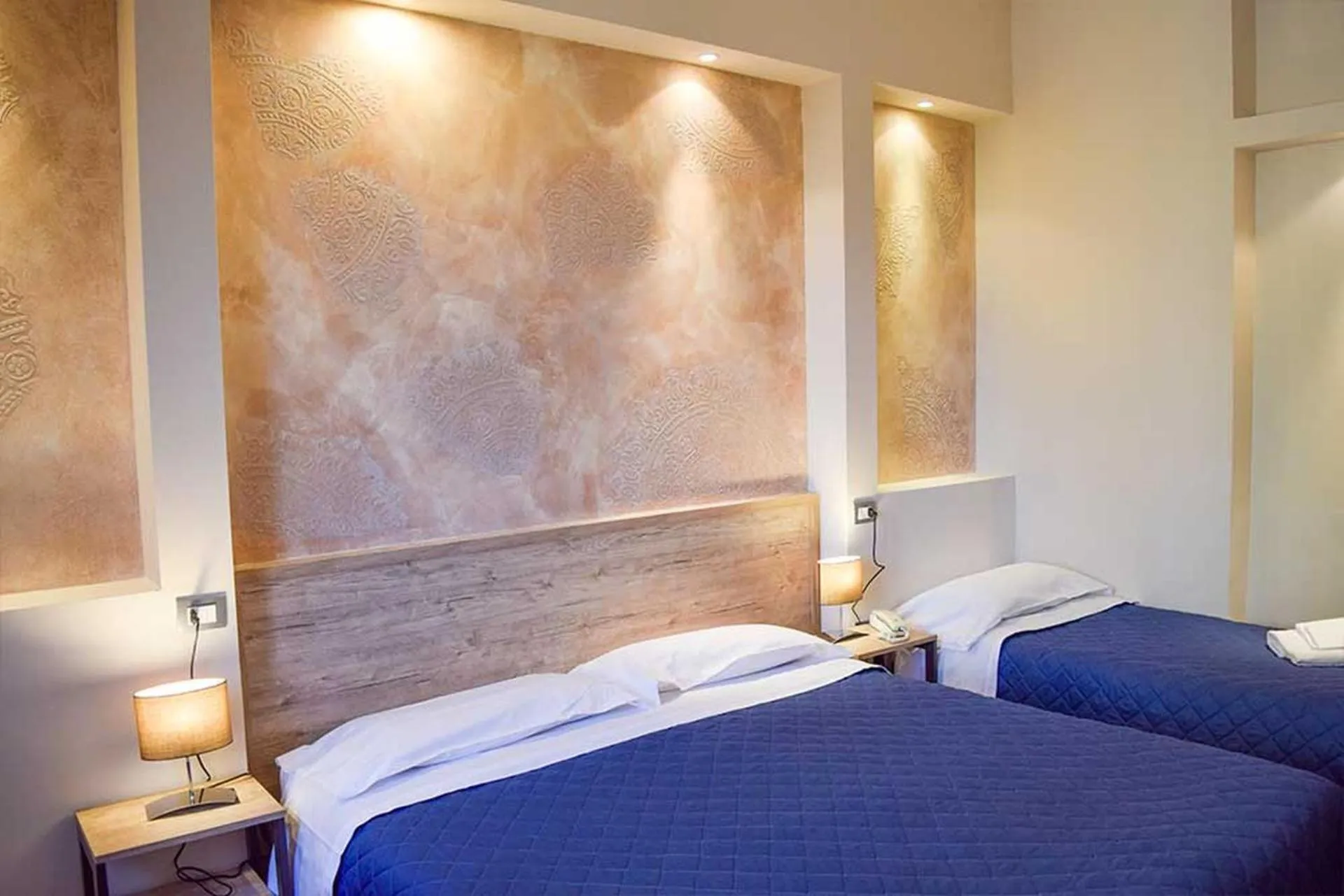 Bed in Le Grazie Hotel