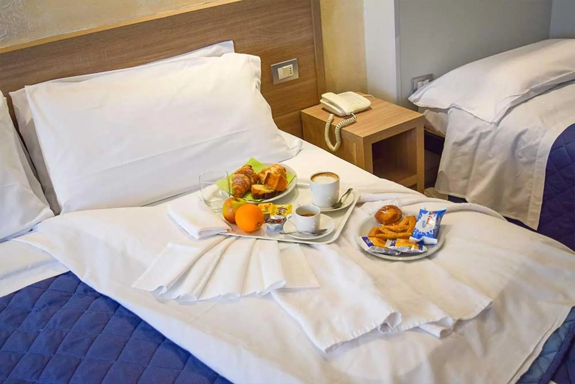 Bed in Le Grazie Hotel