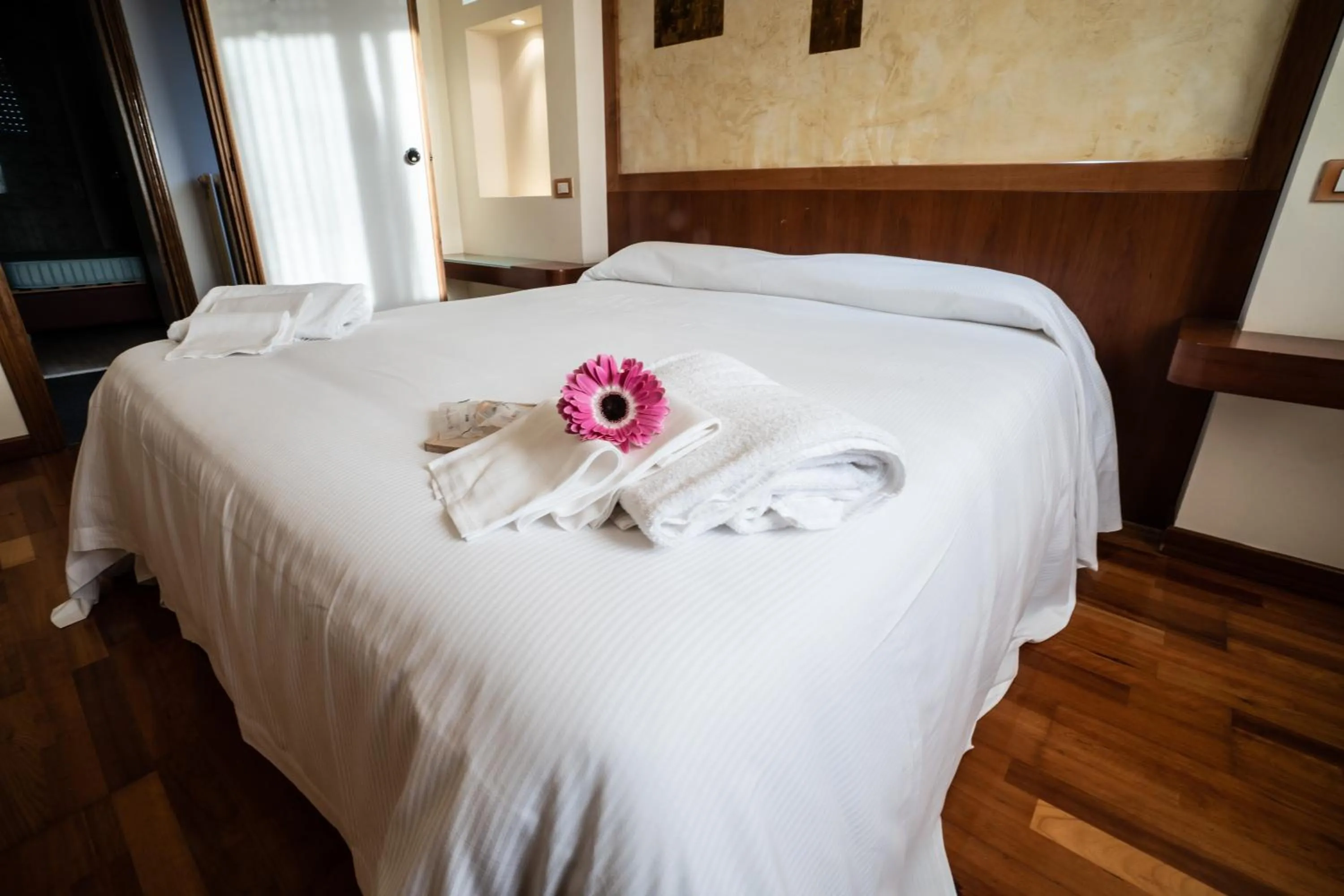 Bed in Le Grazie Hotel