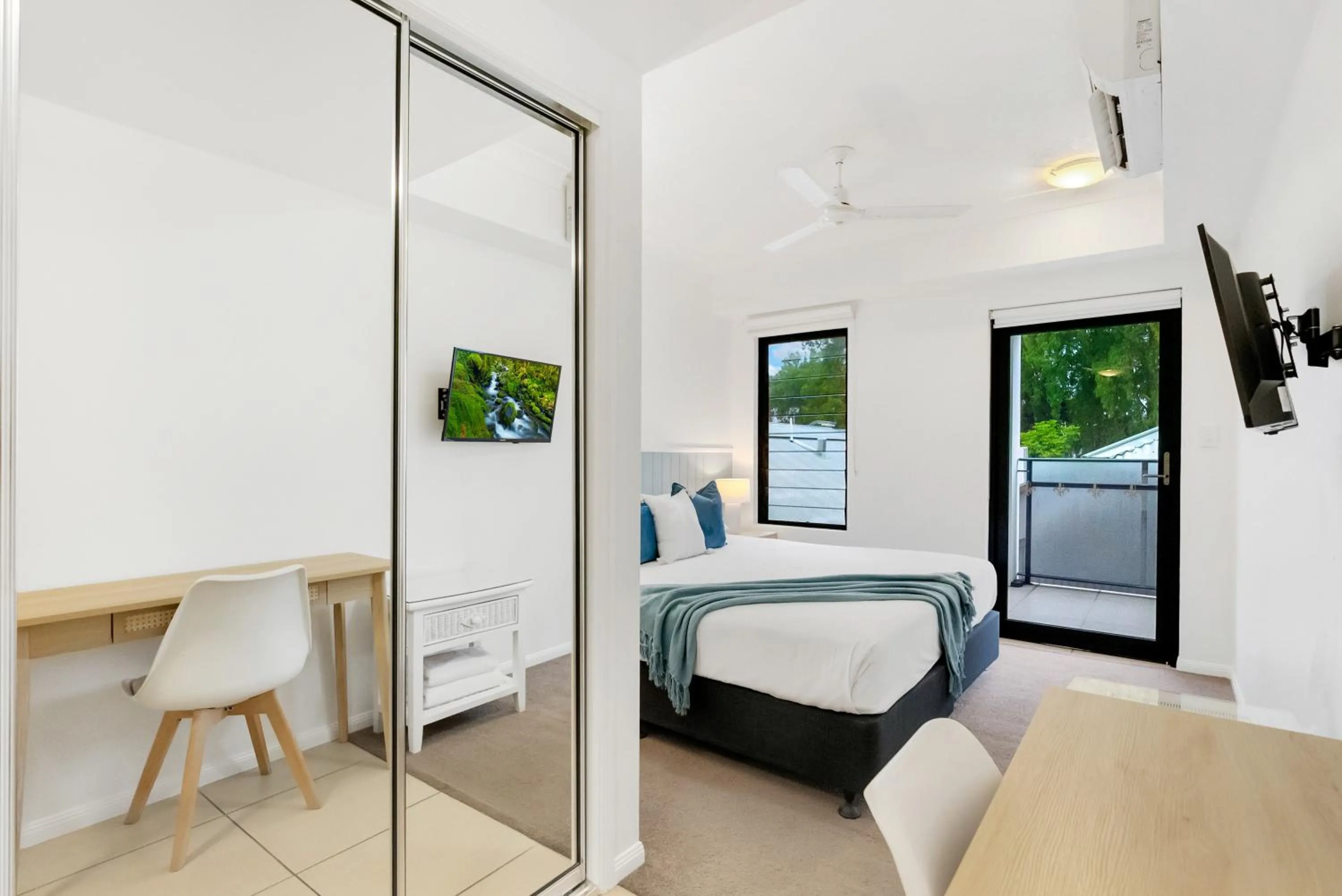 Bed in Elysium Apartments