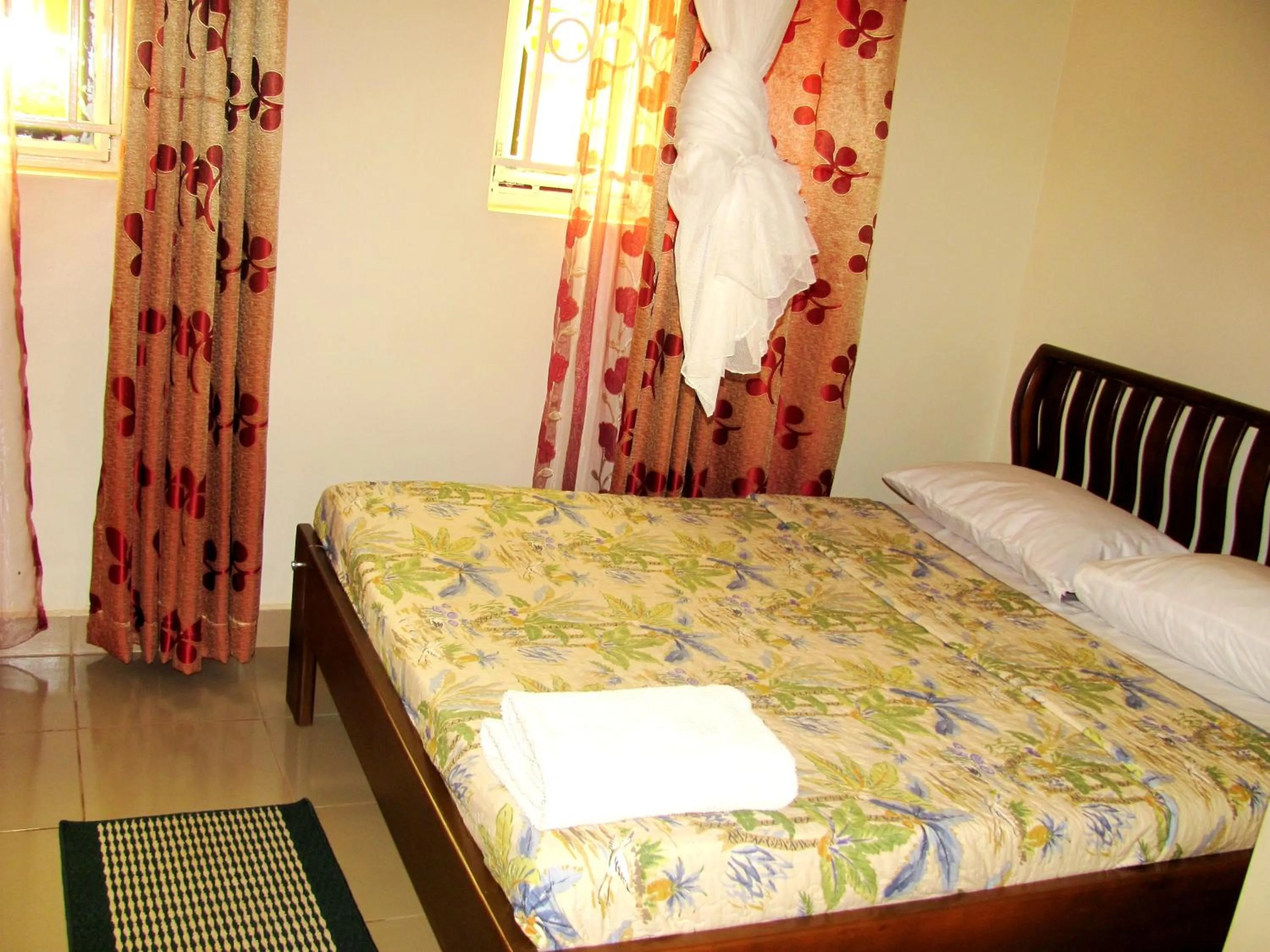 Bed in Sadrina Comfort Cottages Kyanja Kampala