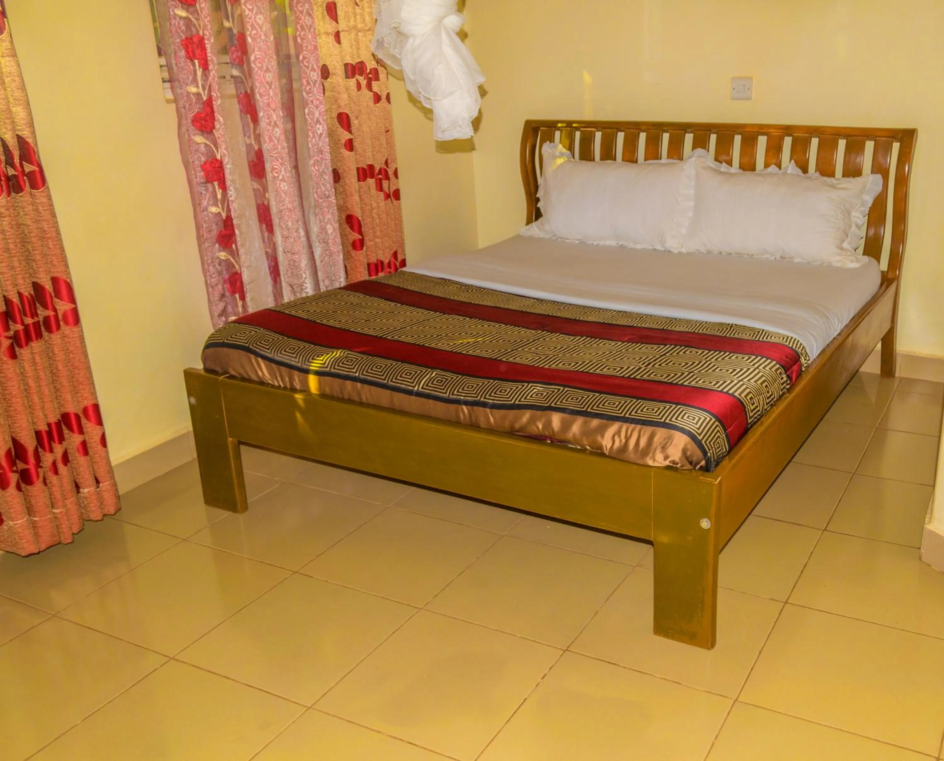 Photo of the whole room in Sadrina Comfort Cottages Kyanja Kampala