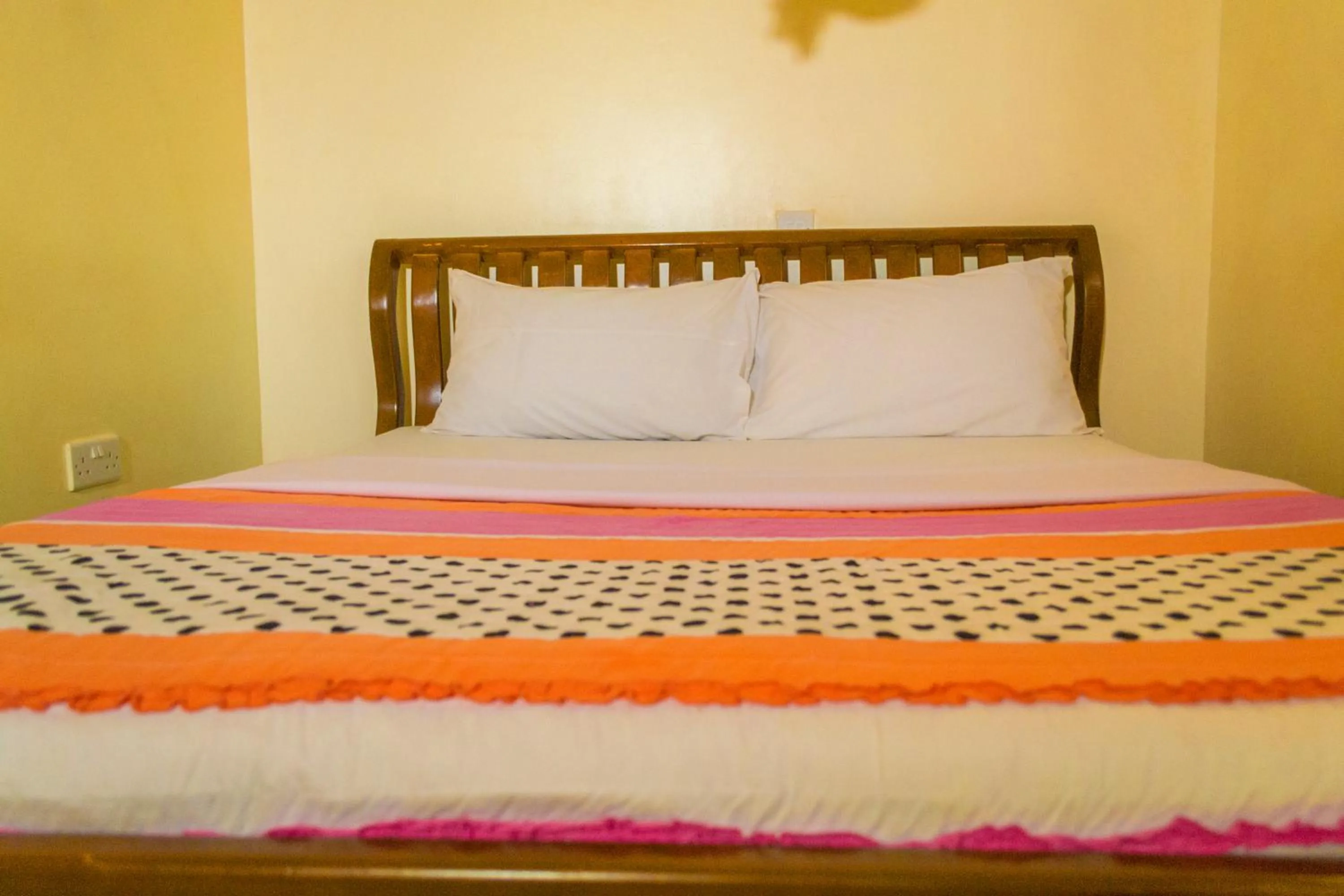 Bed in Sadrina Comfort Cottages Kyanja Kampala
