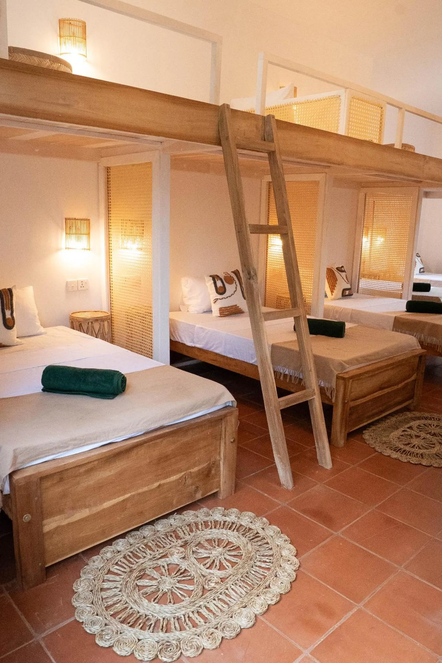 Bed in Basecamp Yoga Beach House