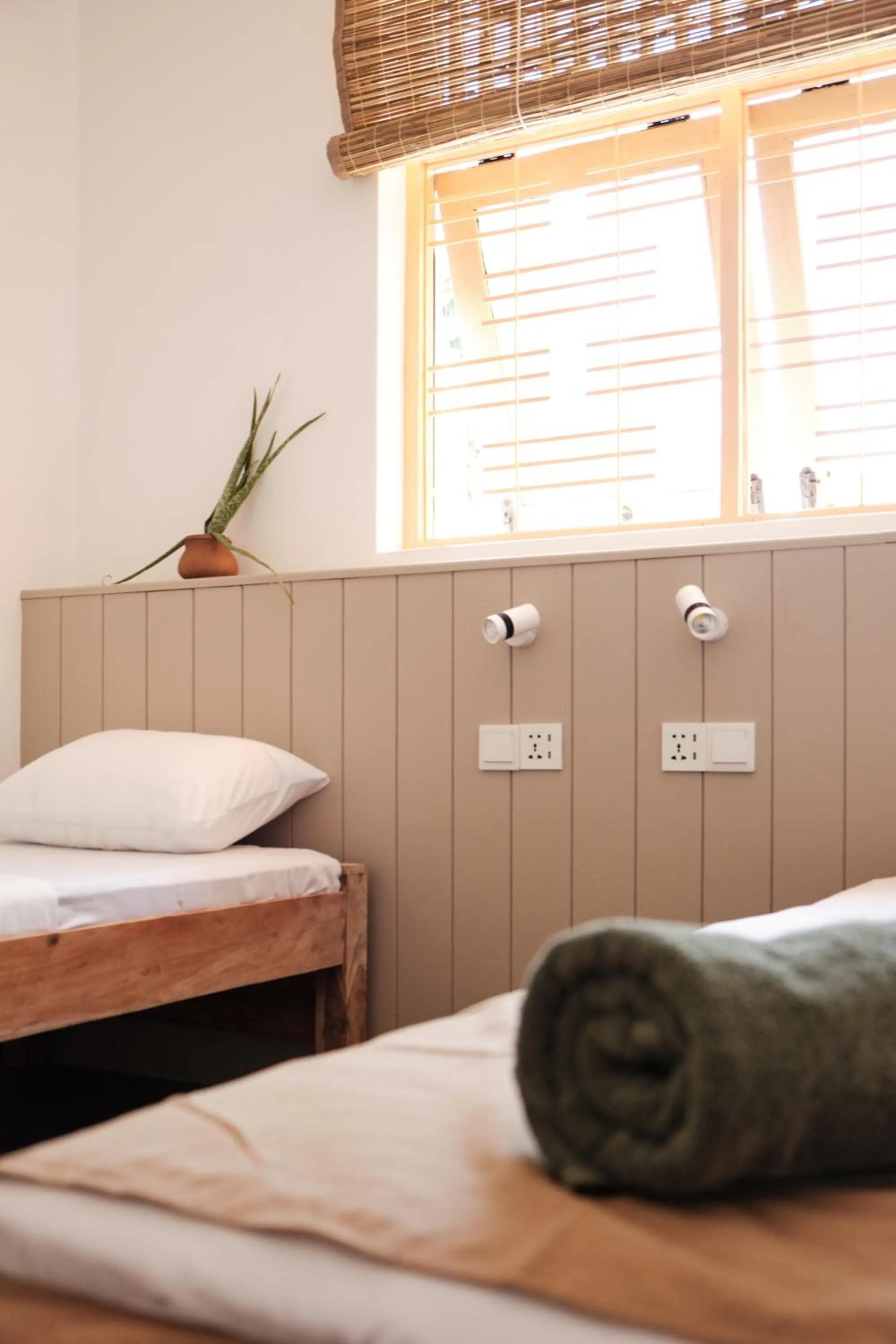 Bed in Basecamp Yoga Beach House