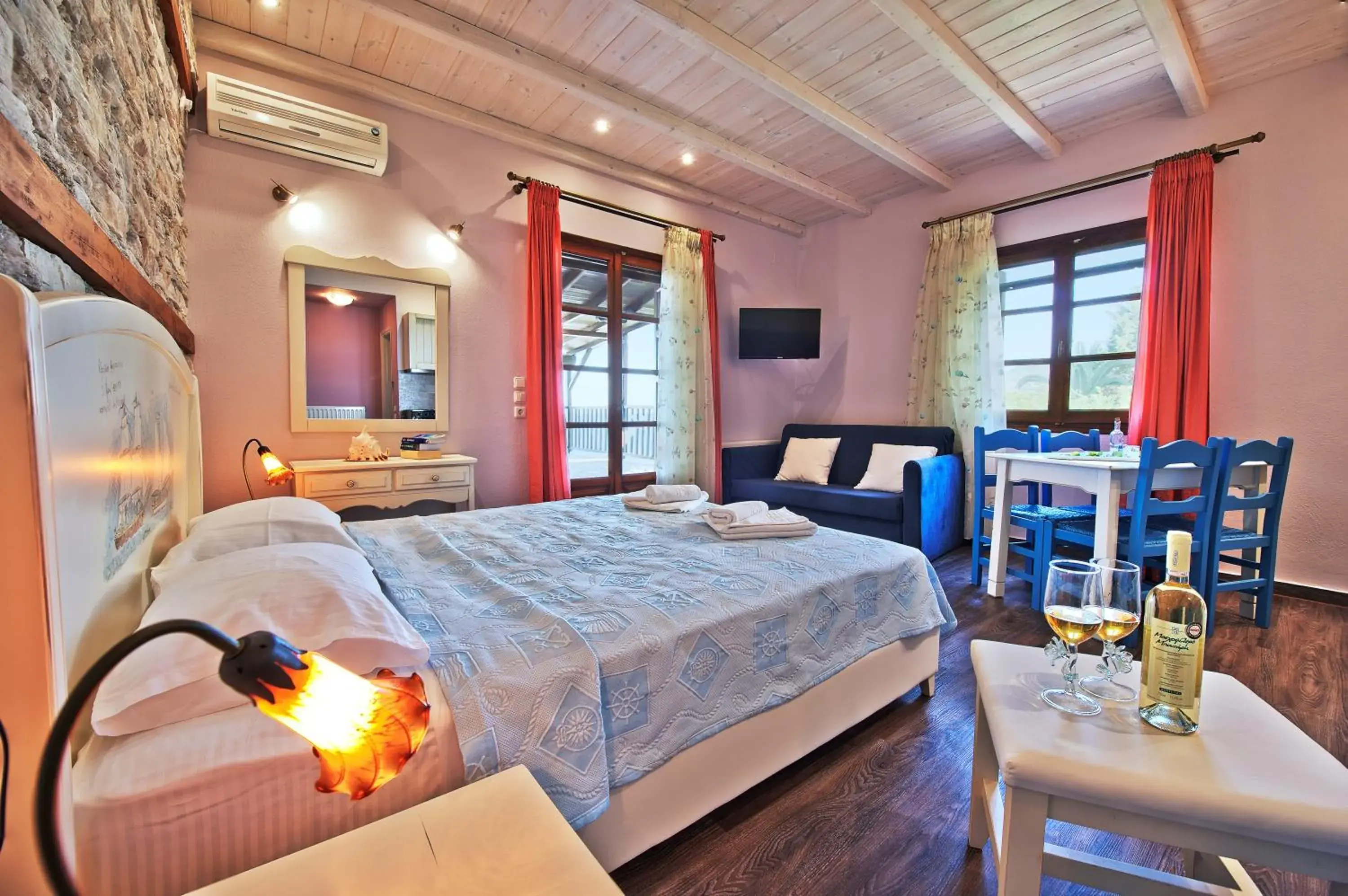 Photo of the whole room, Bed in Flamingo Hotel Pelion - Seaside Superior Studios & Suites Photo of the whole room, Bed in Flamingo Hotel Pelion - Seaside Superior Studios & Suites