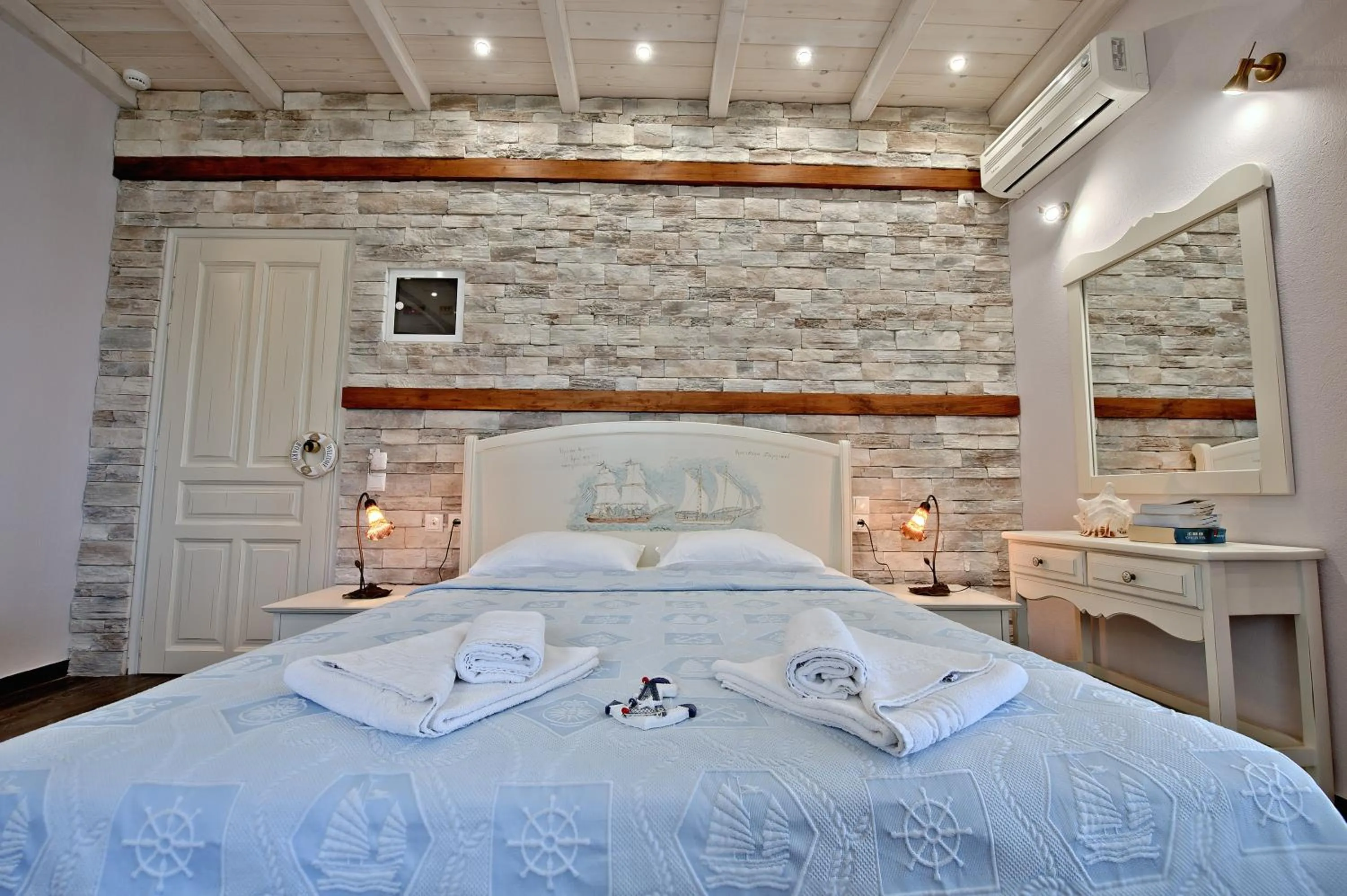 Photo of the whole room, Bed in Flamingo Hotel Pelion - Seaside Superior Studios & Suites