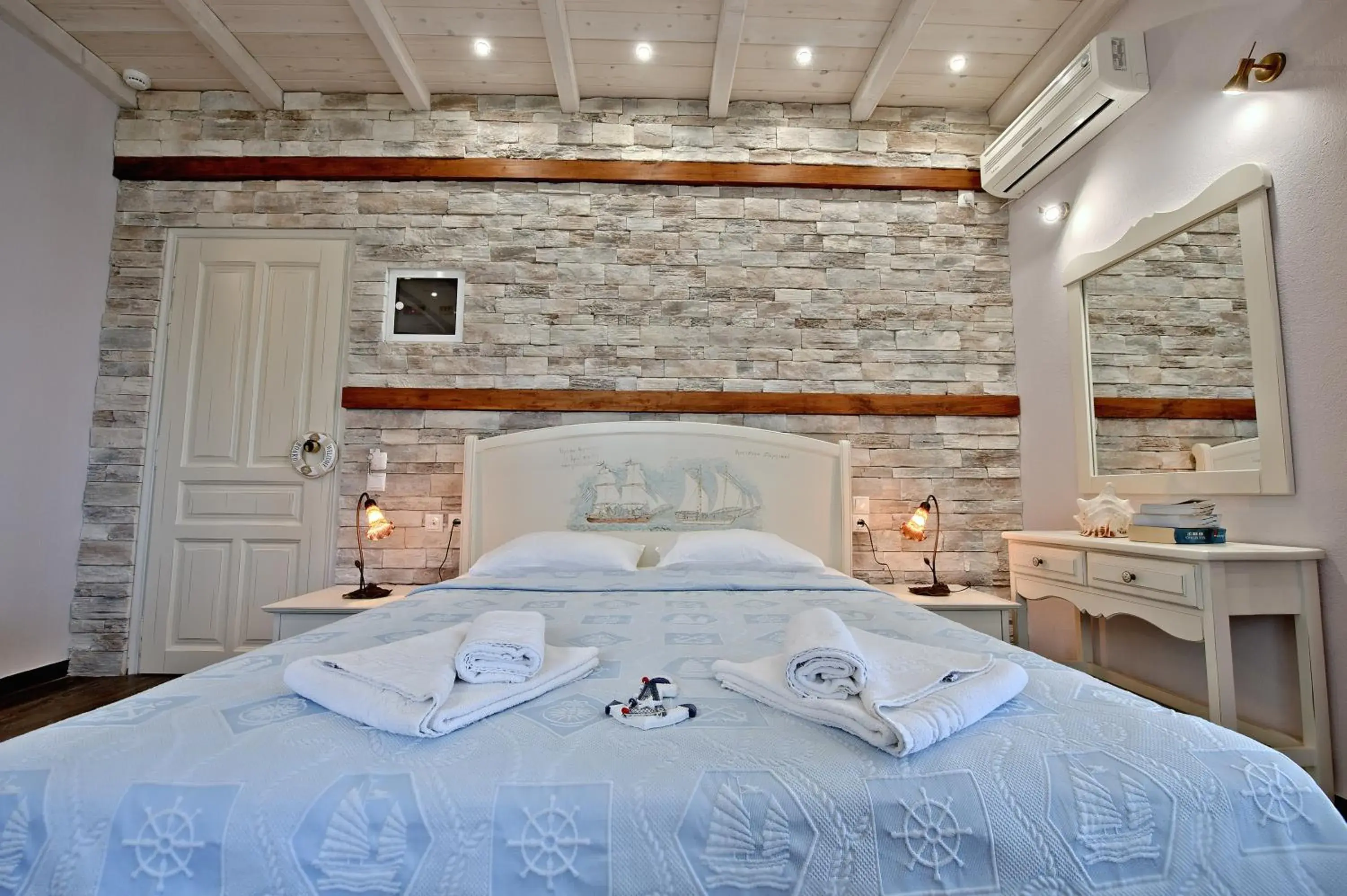 Photo of the whole room, Bed in Flamingo Hotel Pelion - Seaside Superior Studios & Suites Photo of the whole room, Bed in Flamingo Hotel Pelion - Seaside Superior Studios & Suites