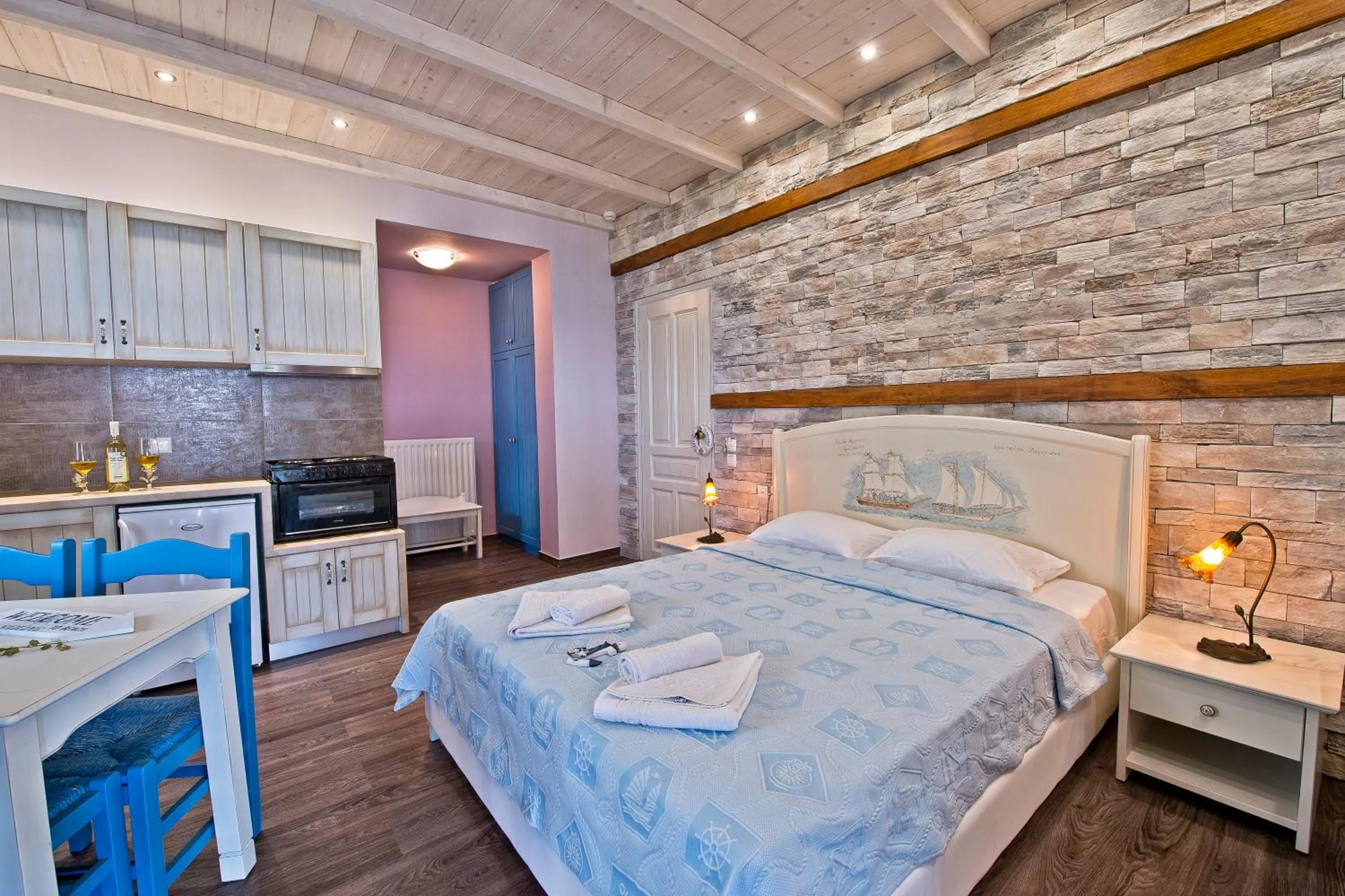 Photo of the whole room, Bed in Flamingo Hotel Pelion - Seaside Superior Studios & Suites