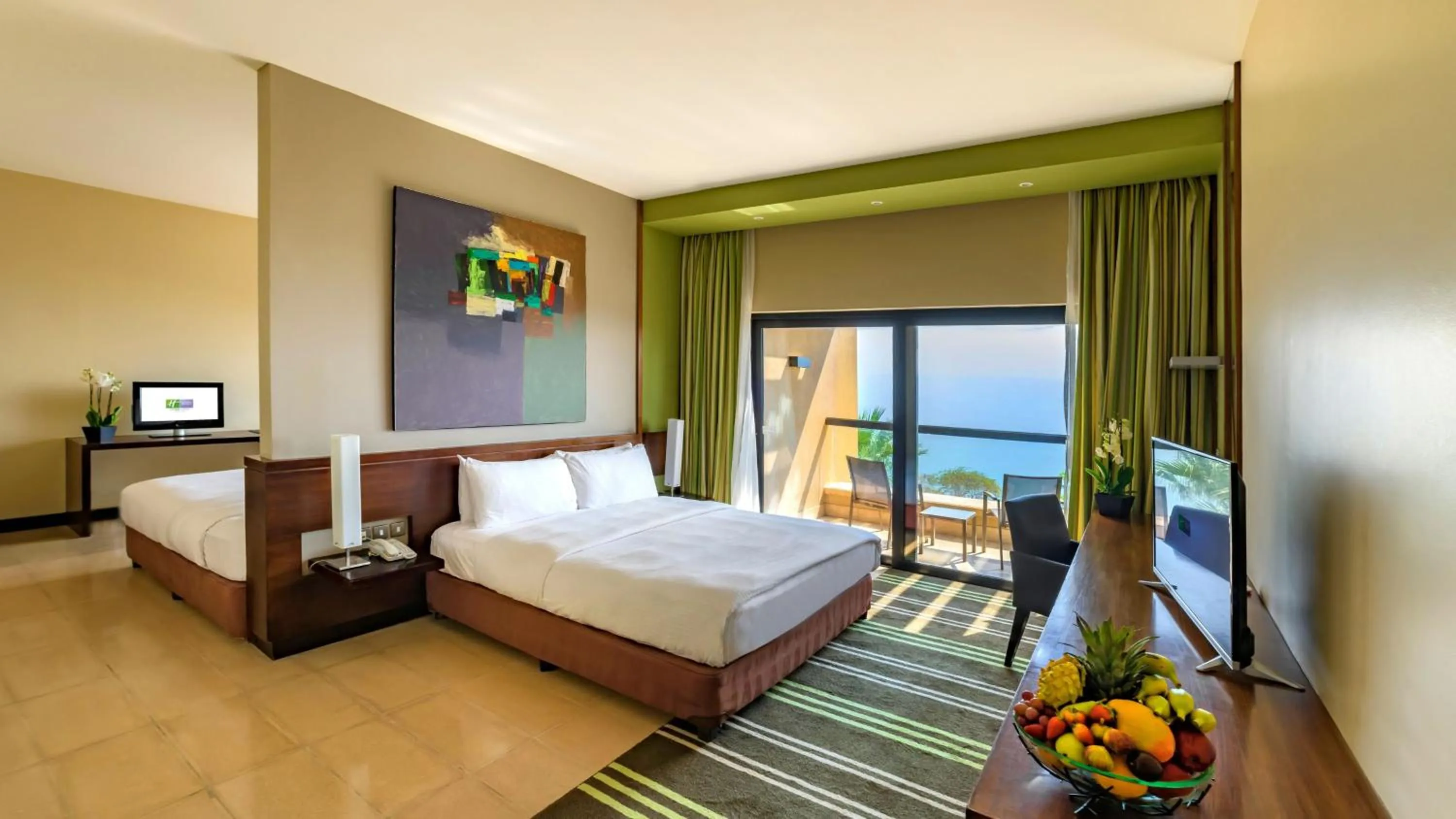 Photo of the whole room, Bed in Holiday Inn Resort Dead Sea by IHG