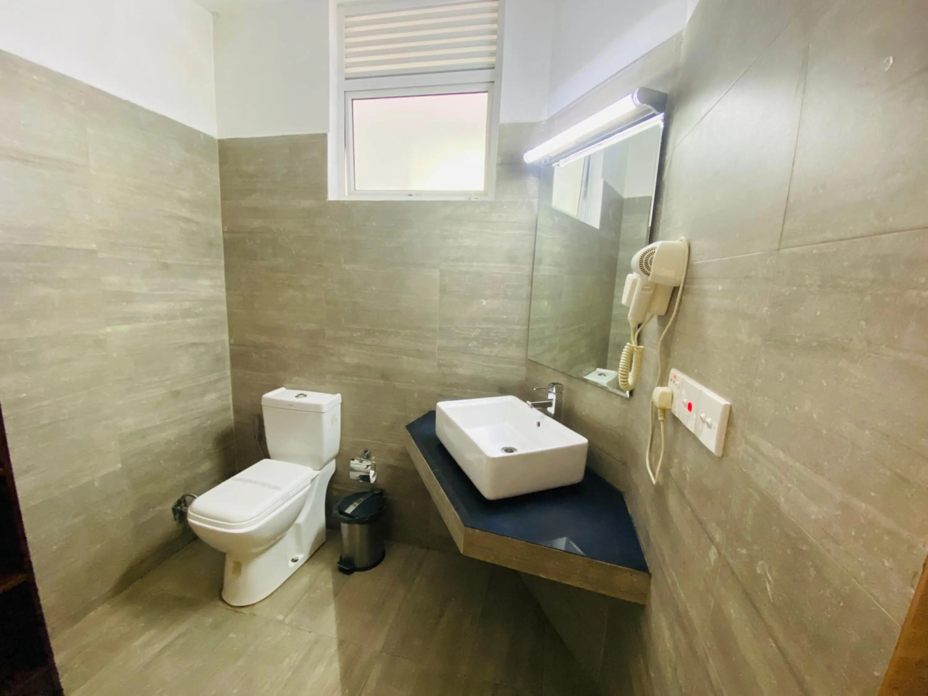 Bathroom in Hotel Gangaaddara