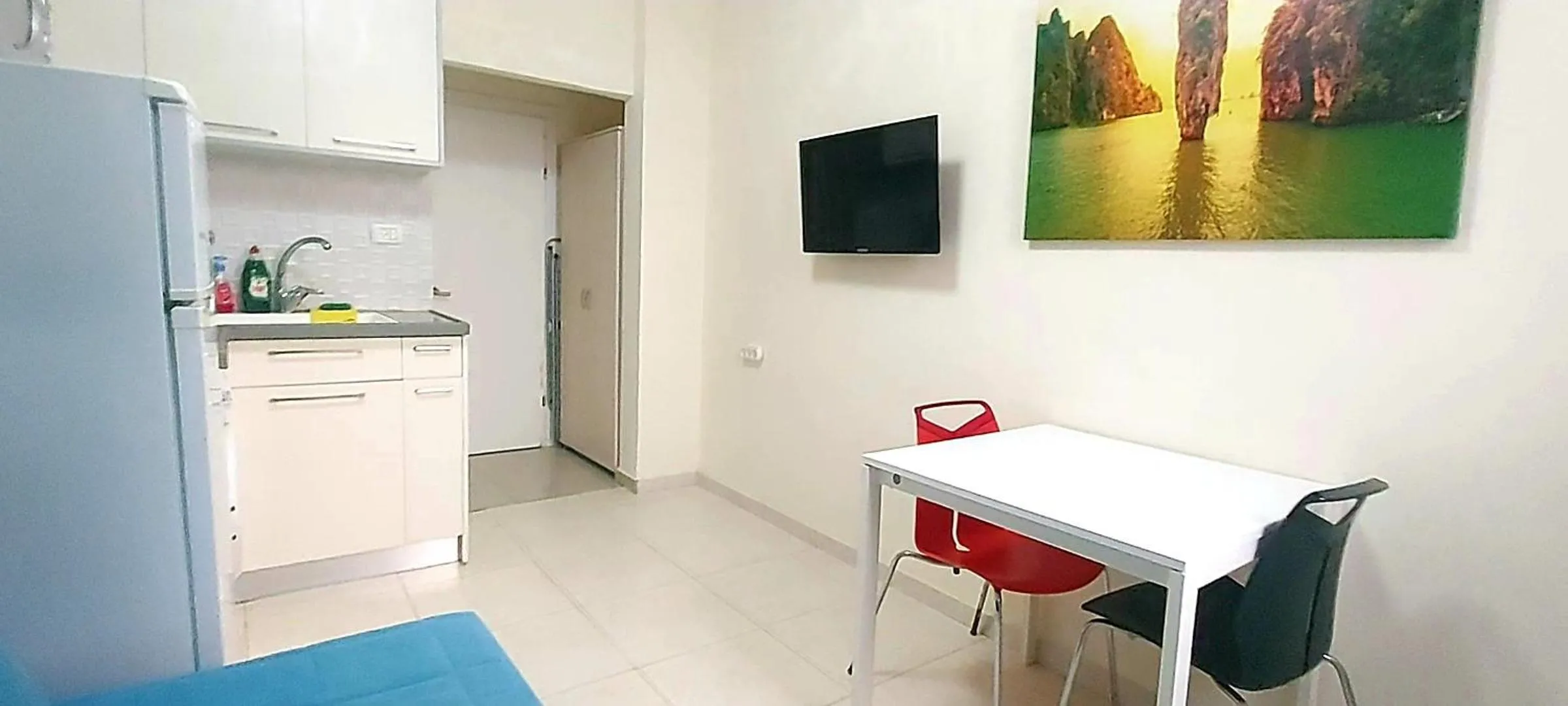 TV and multimedia in Beachfront Studio Apartment Bat Yam 412