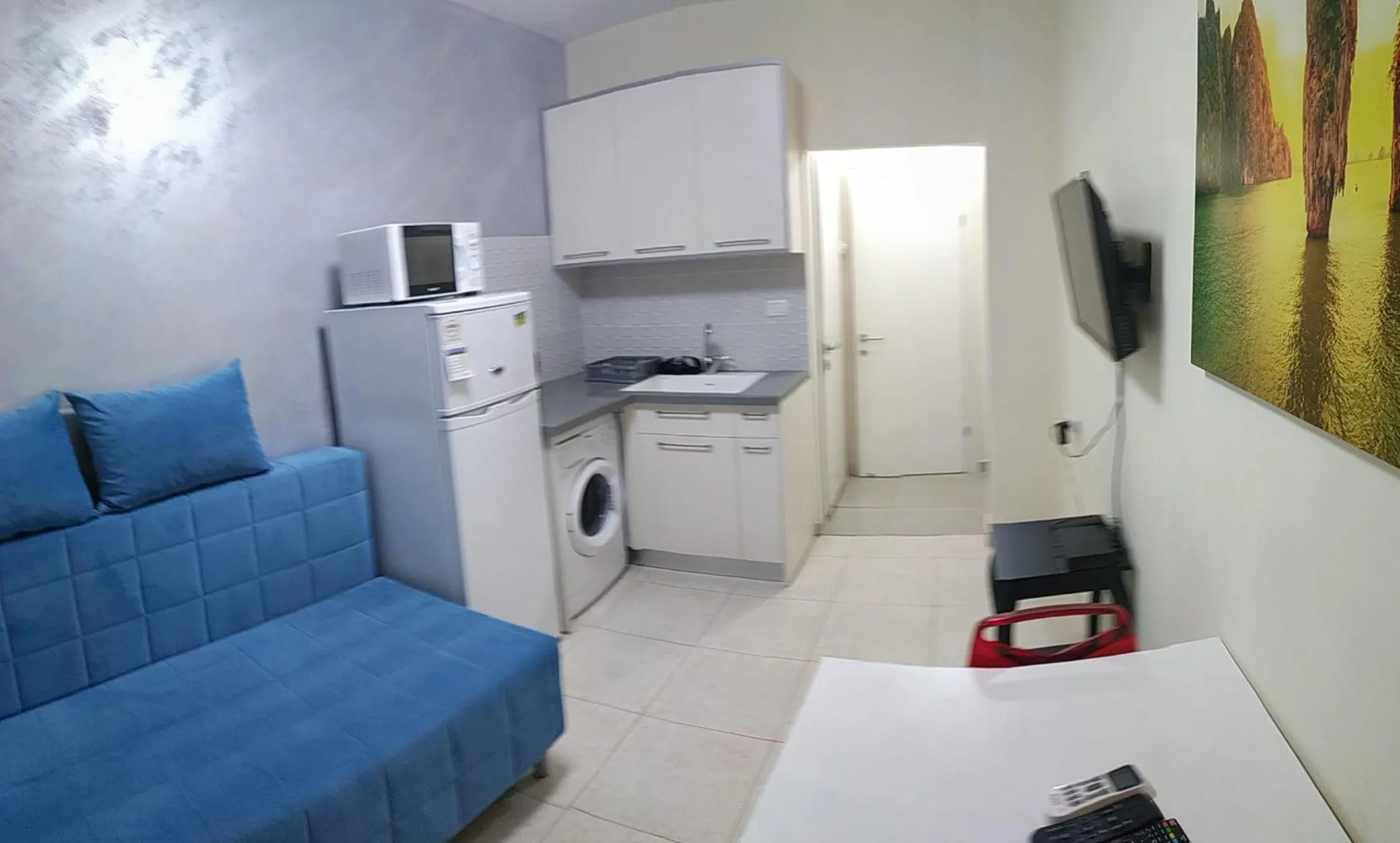 Kitchen or kitchenette in Beachfront Studio Apartment Bat Yam 412