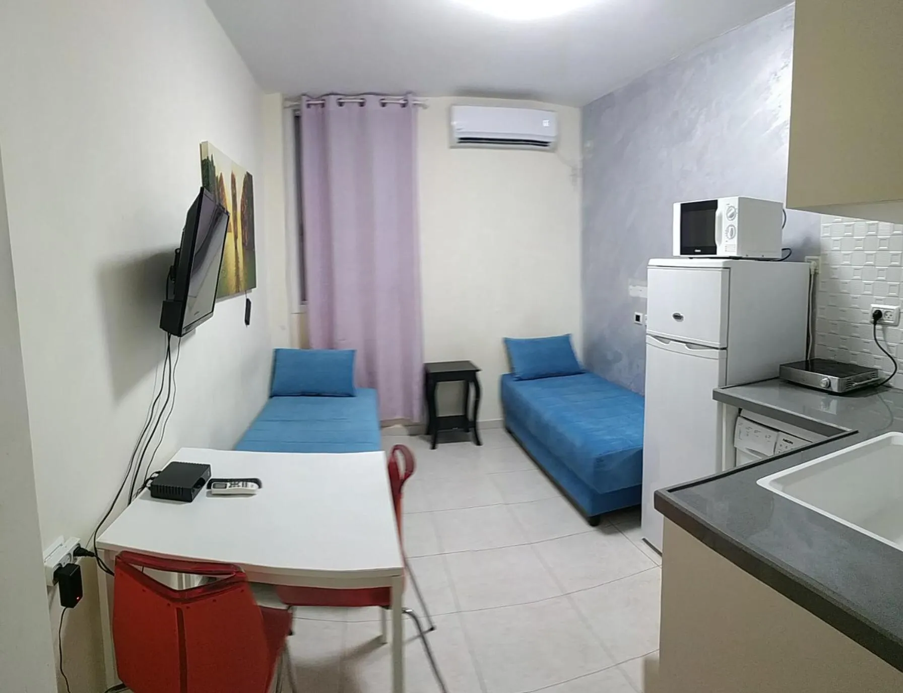 Photo of the whole room in Beachfront Studio Apartment Bat Yam 412