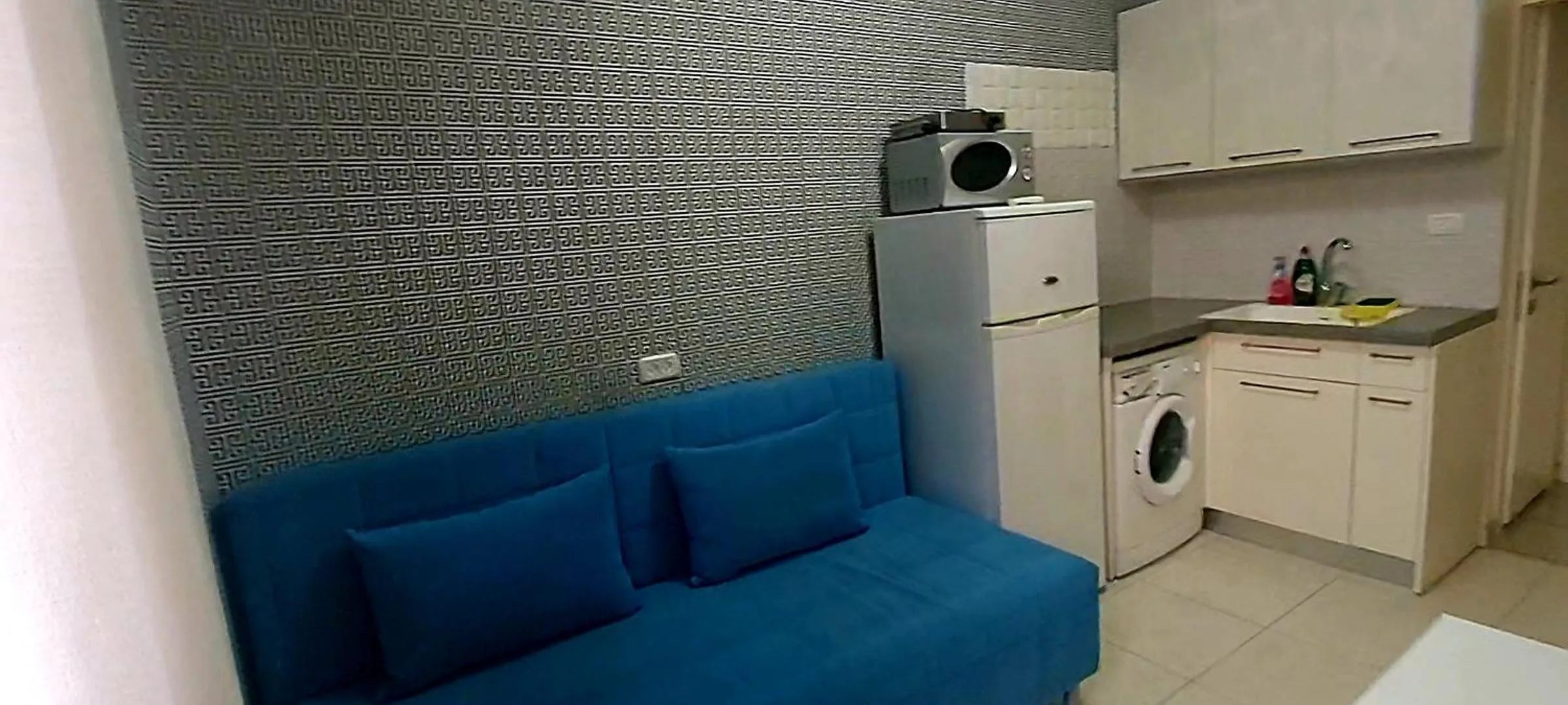 Kitchen or kitchenette in Beachfront Studio Apartment Bat Yam 412