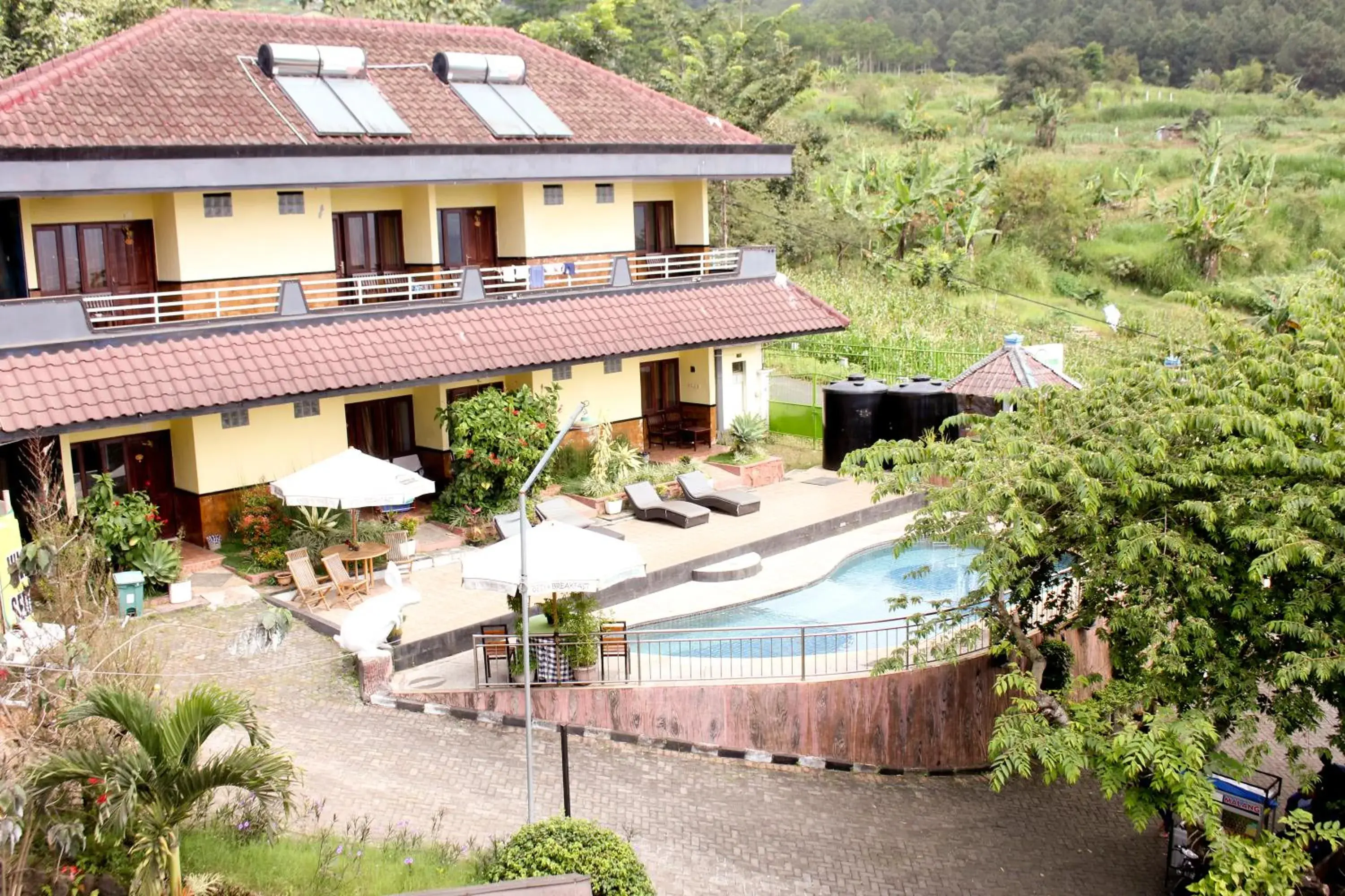 Property building in Villa Panderman Indah Property building in Villa Panderman Indah