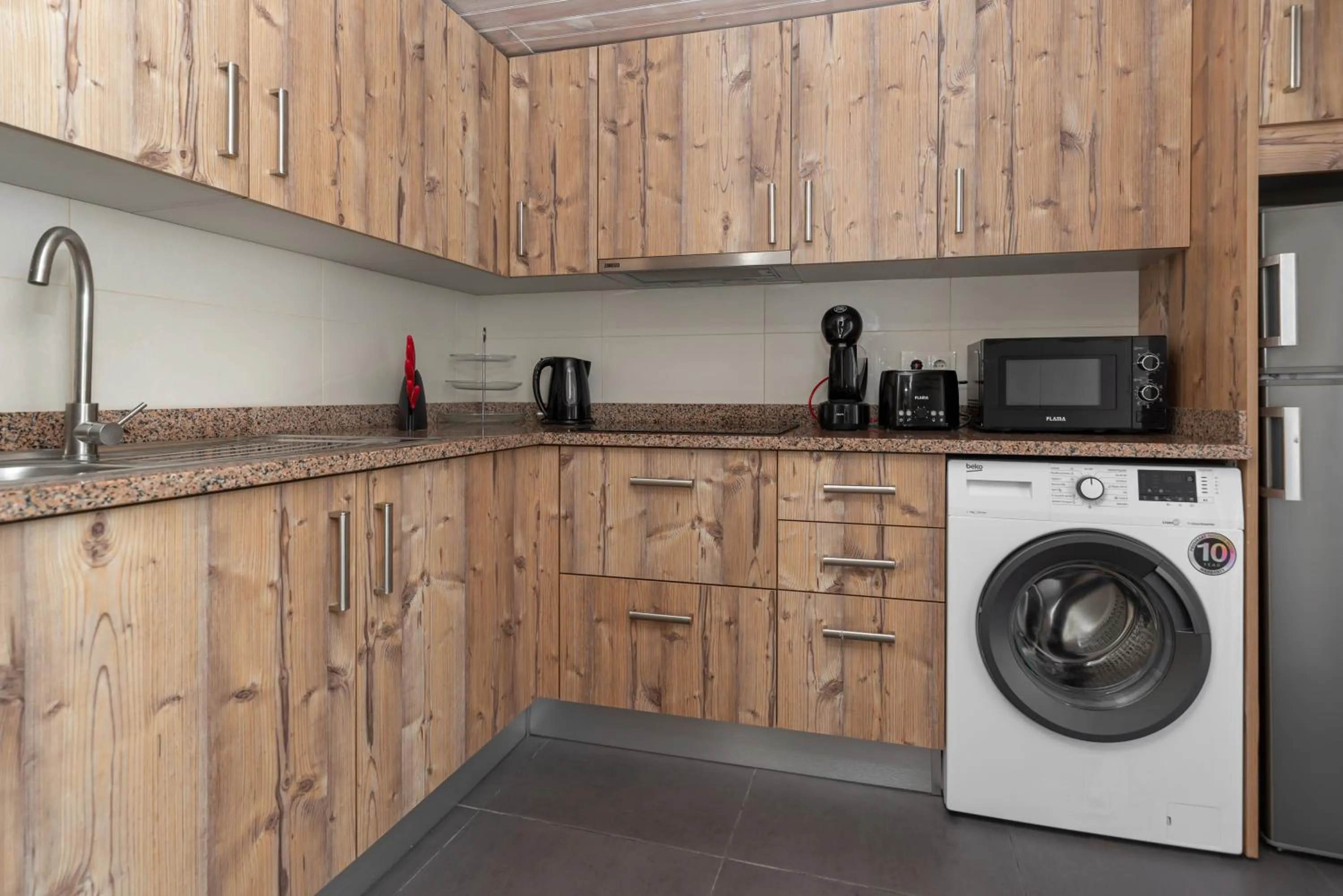 Kitchen or kitchenette in Villa Rio Guest House Suites