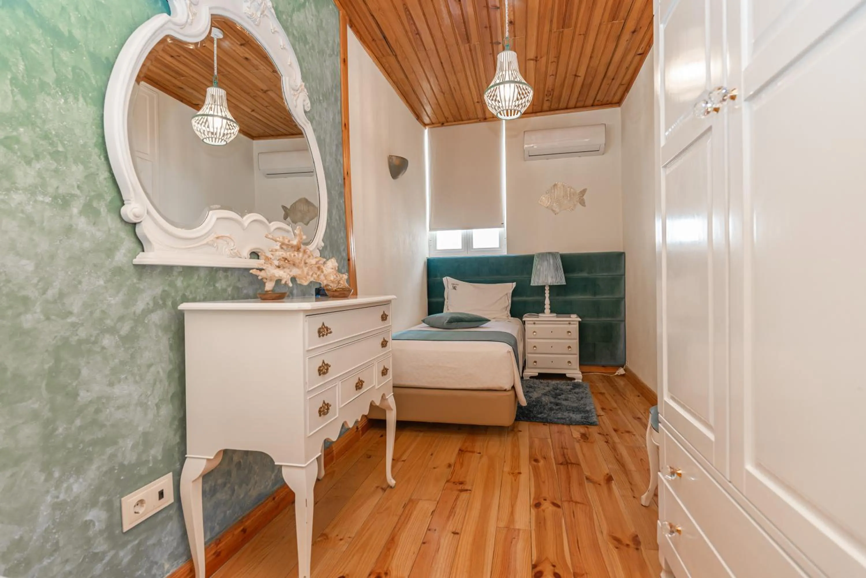 Bedroom in Villa Rio Guest House Suites