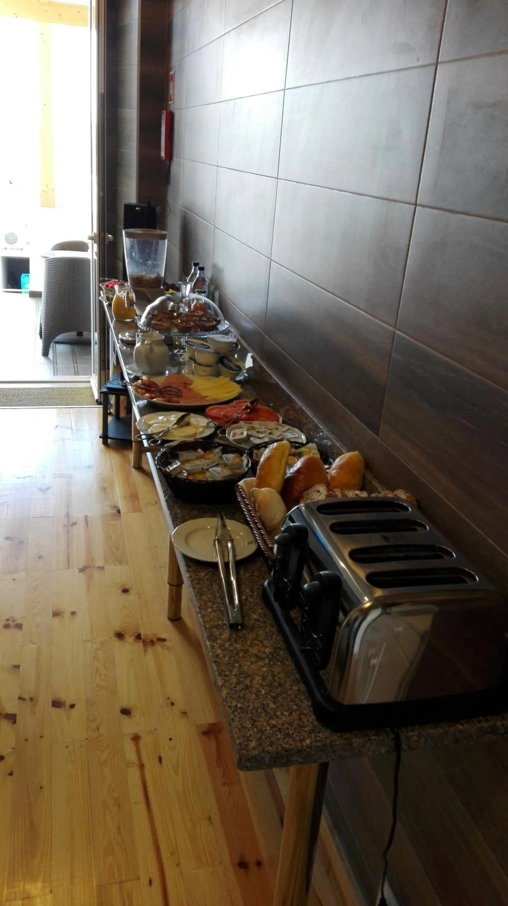 Breakfast in Villa Rio Guest House Suites