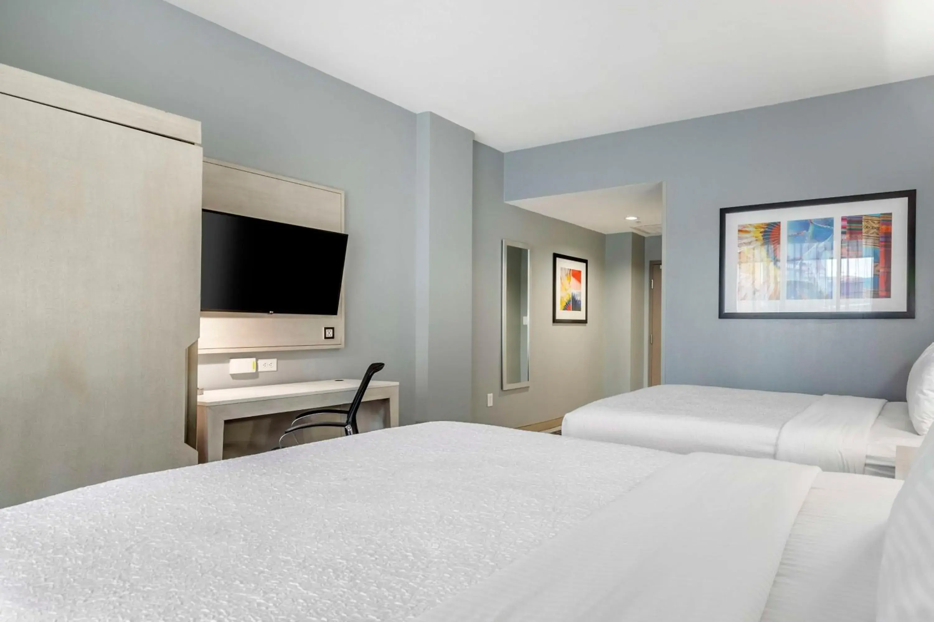 Bedroom in Best Western Premier Historic Travelers Hotel Alamo/Riverwalk Bedroom in Best Western Premier Historic Travelers Hotel Alamo/Riverwalk