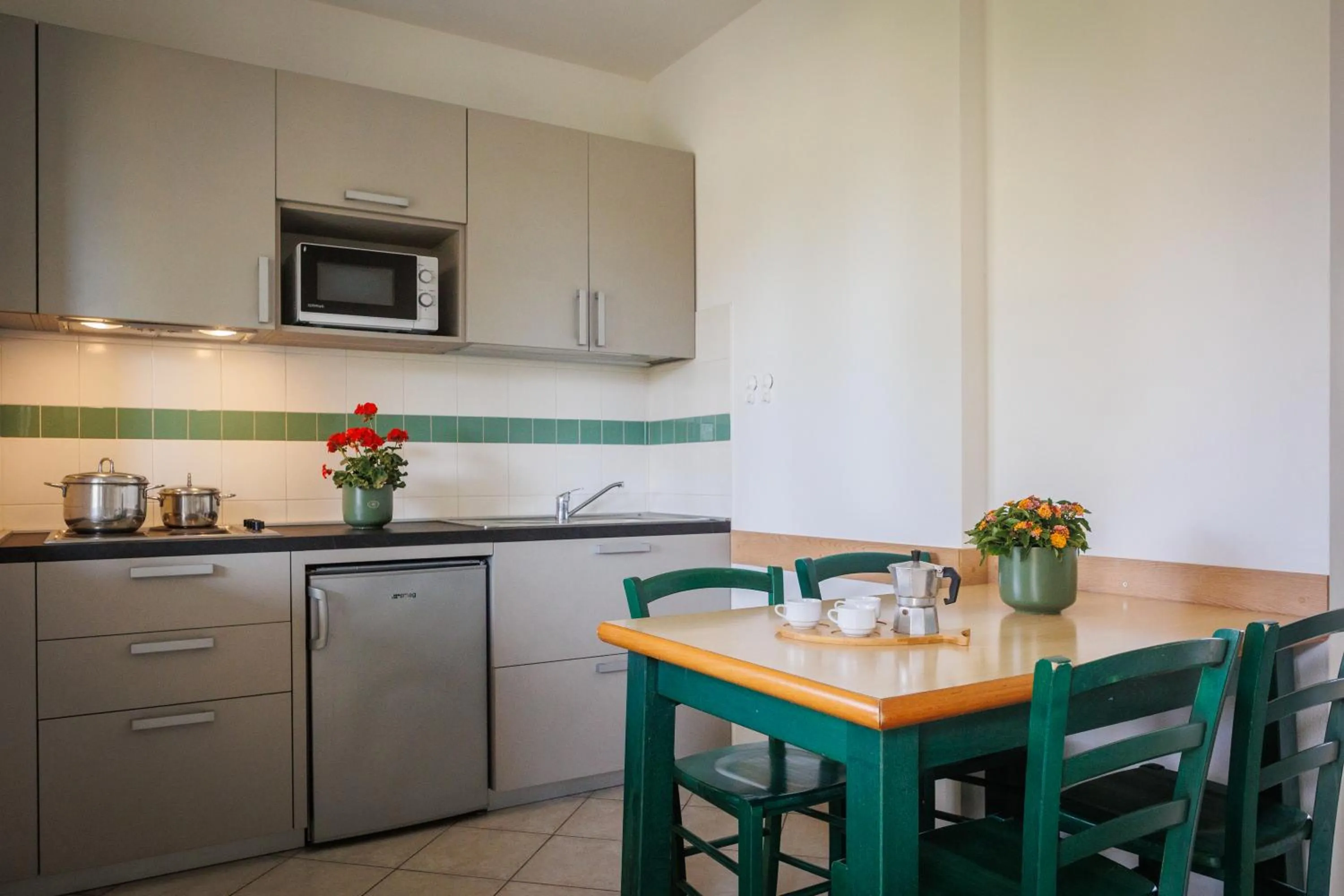 Kitchen or kitchenette in Villaggio Turistico La Cecinella