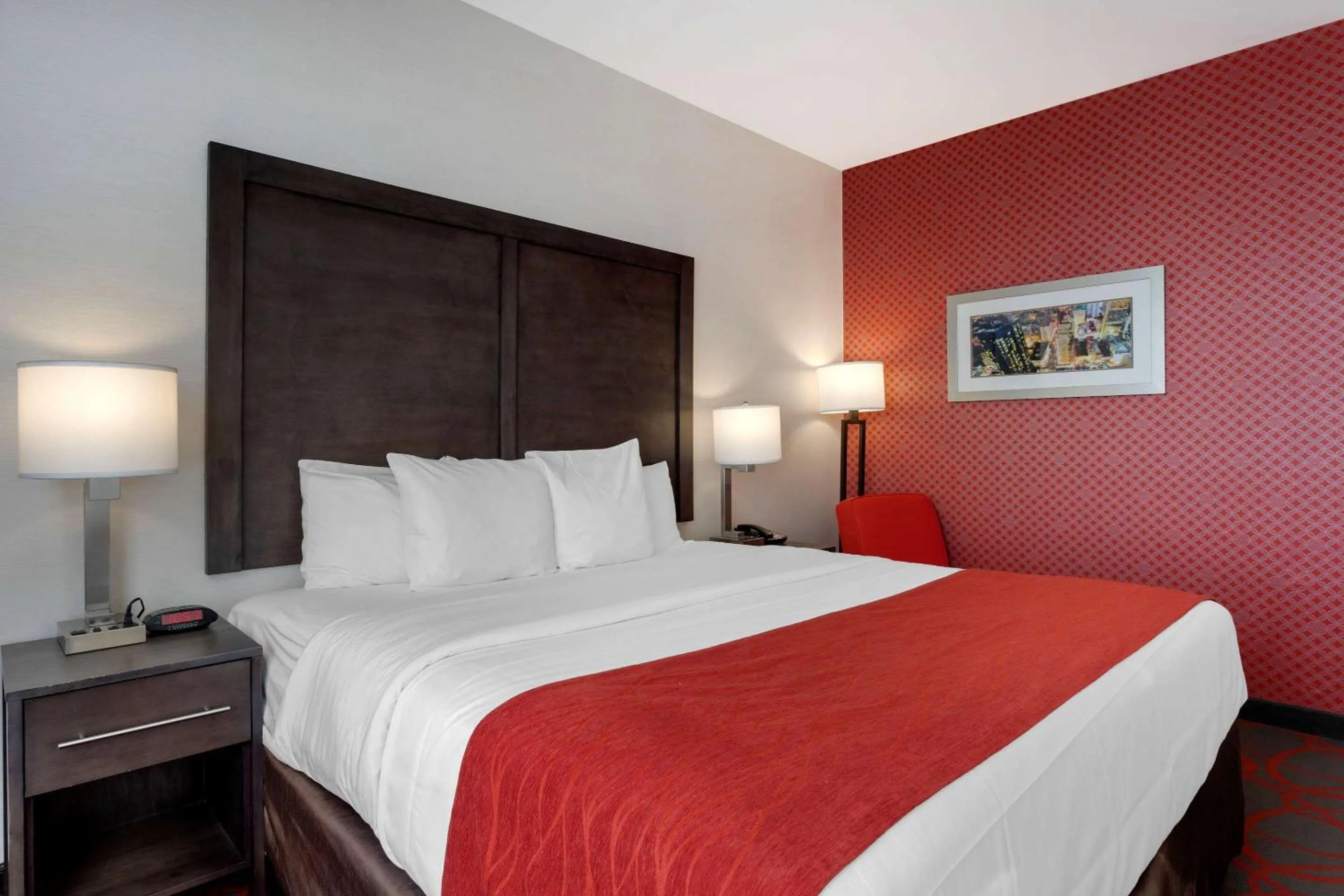 Photo of the whole room, Bed in Comfort Inn & Suites near Stadium