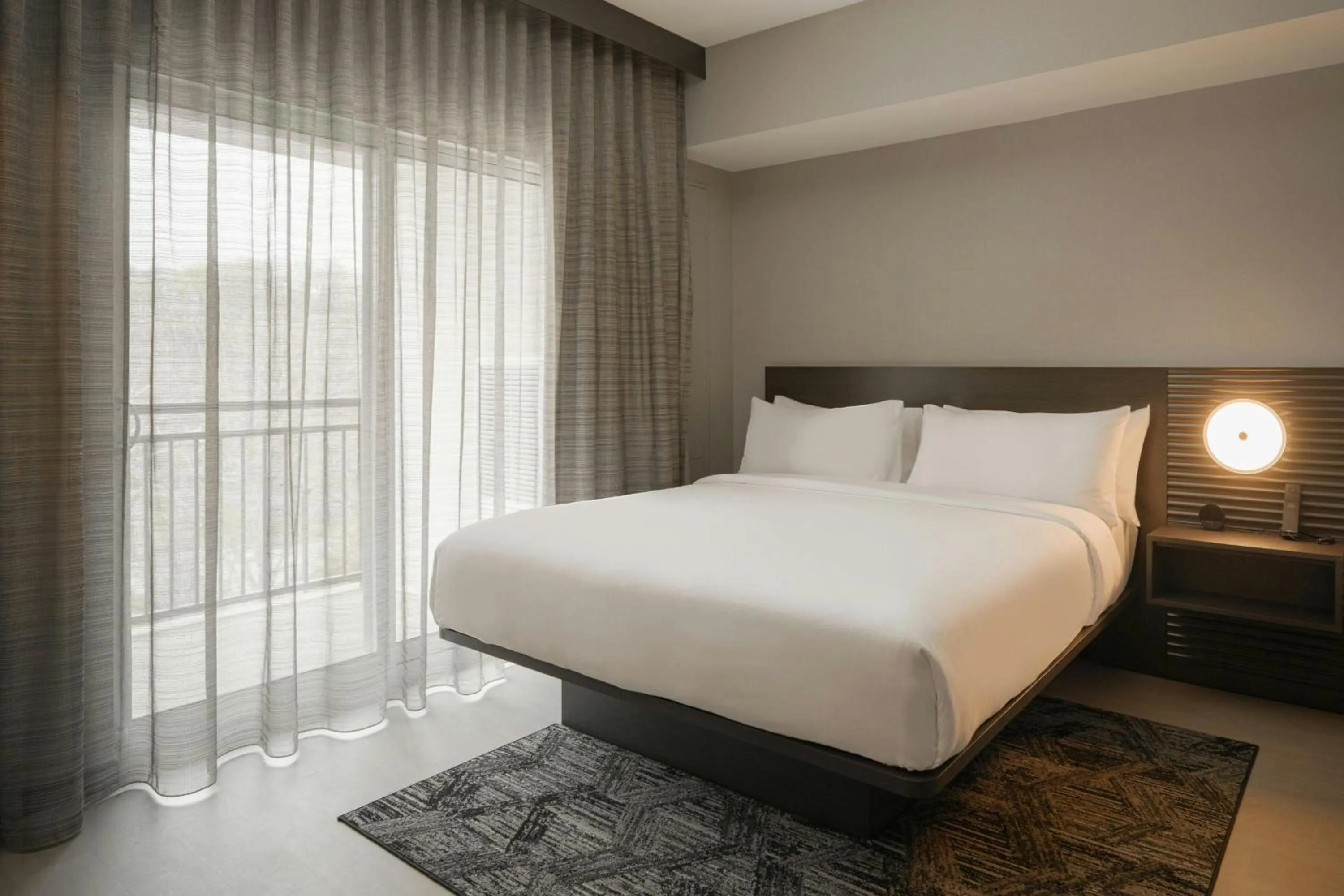 Photo of the whole room, Bed in AC Hotel Asheville Biltmore Village